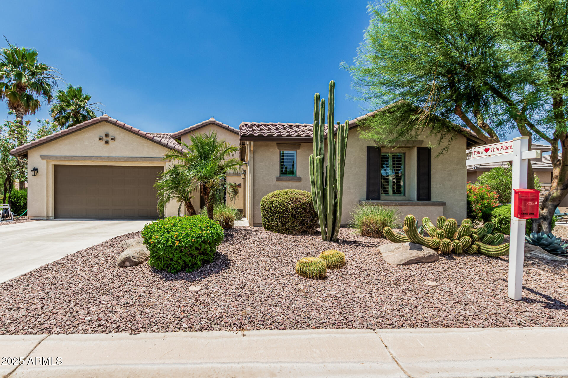 Popular Miramonte home in the perfect location. Upgraded 2 bedroom, Den + 2.5 baths with over 2200 livable sq. footage on a premium N/S facing lot with pocket park next door. No carpet through out. Open kitchen with plenty of cabinets, soft close drawers, pull outs, granite countertops w/full backsplash + a kitchen island w/high top bar. Bay window in kitchen. Large master bedroom with bay window, custom shower, with double sinks. Guest bedroom en-suite. Full single car (man cave) garage with mini-split and a full double car garage. Plenty of room for 2 cars and a golf cart. Tons of upgrades. Beautiful backyard with pergola, shades, extended pavers, firepit, cooking center & more. New HVAC 2/2026.  New hot water heater 6/2025.  Stop by to see this one soon.