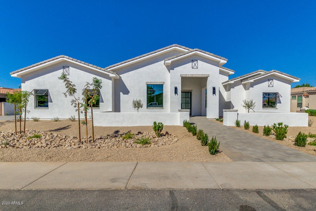 GCW Builders has done it again! This beautiful, 4514 sq ft open floor plan custom home is the newest home in the highly sought after Whitewing neighborhood. This home has a large master suite with double master closets and a guest suite with on-suite bath. This 4 bedroom home's great room 18ft ceilings with box beams and shiplap gives you the initial WOW factor that you don't want to miss. Fully stocked with Wolf Sub Zero appliances throughout, super pantry, double sinks with RO and a 16x5ft island are an entertainer's dream. The 16x10ft glass slider looks out to the column Ficus trees lining the perimeter wall for ultimate privacy. The huge game room is strategically placed off the great room with a separate slider to the outside patio. Too much to list but this is truly a MUST SEE HOME! ESTIMATED SEPTEMBER 2020 COMPLETION