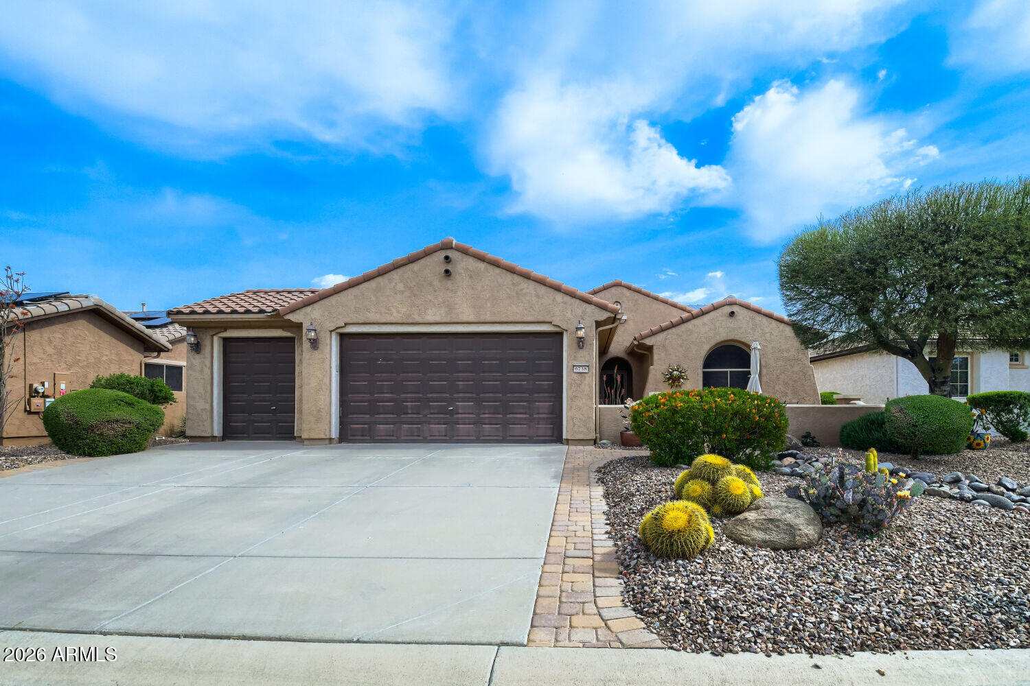 OWNED  SOLAR with no lease and major system updates make this move-in ready home a standout. Recent improvements include a 16 SEER Trane A/C, gas furnace, water heater, and water conditioner. Additional features include granite counters, stainless steel appliances, an RO water system, built-ins, accent walls, surround sound, and a landscaped yard. The garage offers cabinets, a workbench, and room for a golf cart. Conveniently located near community amenities.