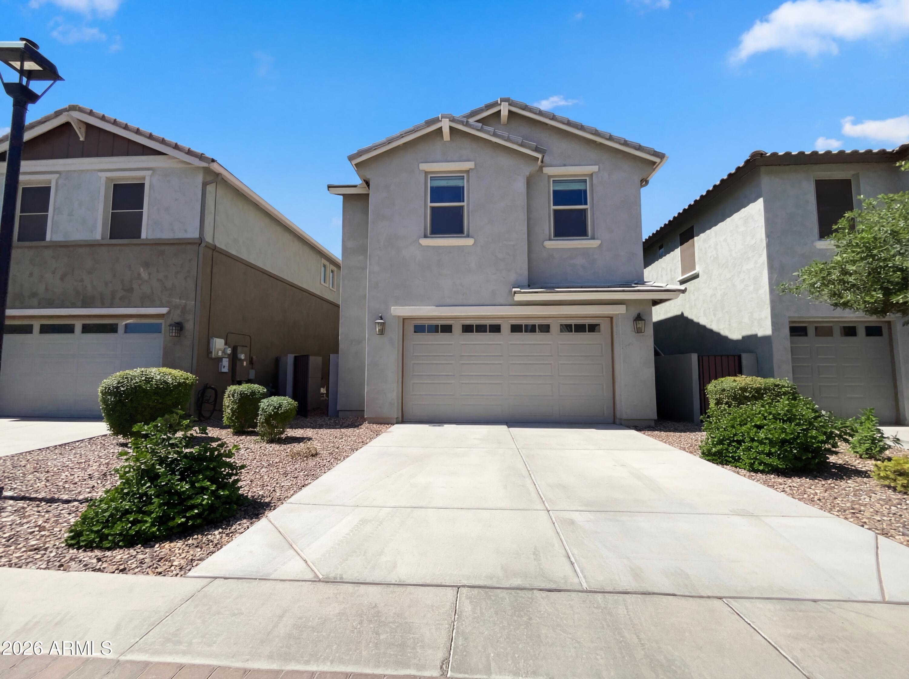 Welcome to 2511 S Entwistle St, a move-in ready home in Cooley Station with 3 bedrooms, 2.5 baths, loft, and a 2.5-car garage with extra storage. Open kitchen with granite counters, island with breakfast bar, pantry, and separate dining area. Large atrium sliding doors bring in great natural light and open to the backyard. Upstairs features an oversized primary suite with dual sinks, large shower, and walk-in closet, plus a loft and laundry room with cabinets!  Come visit now! Included 100-Day Home Warranty with buyer activation