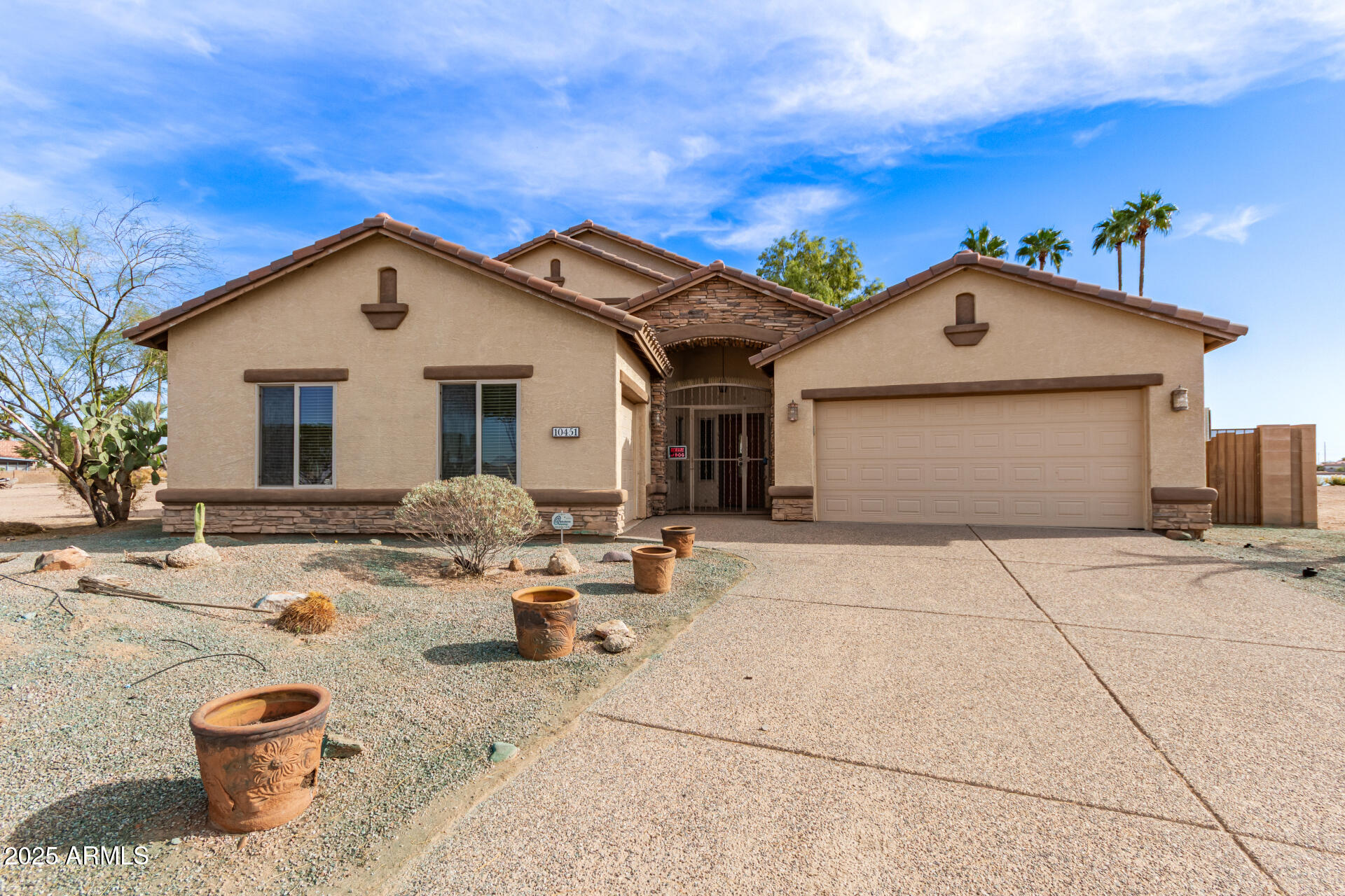 BIG PRICE REDUCTION---GORGEOUS WATERFRONT HOME  on a cul-de-sac.. charming stone-accented facade, an easy-care landscape, and a 3-car garage. Step inside to fall in love with the warm and inviting living spaces, showcasing tile flooring, soaring vaulted ceilings, arched passageways, and an earthy palette that will make you want to stay. The impeccable kitchen features staggered cabinets adorned with crown molding, tile backsplash, granite counters, SS appliances, and an island with a breakfast bar.  3 bedrooms are upstairs and the spacious master suite (on the first floor) boasts a tray ceiling, a walk-in closet, a spa-like bathroom with dual vanities and a separate shower & tub, and an exit to the patio, where you can enjoy the fantastic lake views - sunsets etc, Get ready for weekend grills and fun evenings in the backyard, complete with a covered patio where you can enjoy your morning brew, and a soothing landscape that complements the beautiful lake views. You will have all the space you need, comfort, and a piece of nature in this home. Don't miss it!
