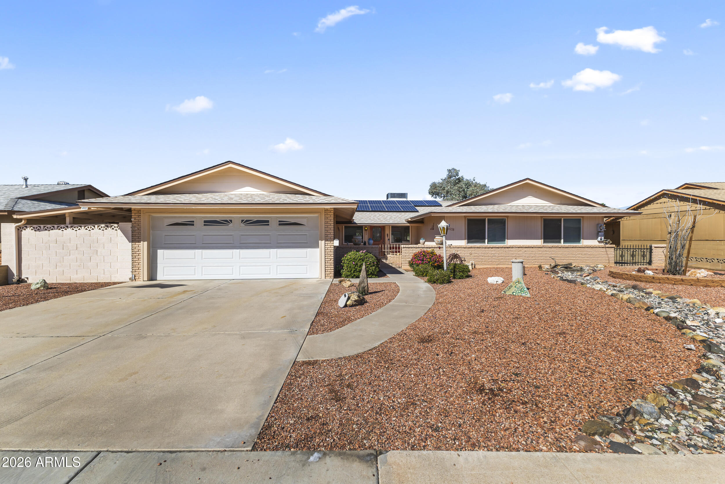 Welcome to this well-maintained home nestled in the heart of Sun City, where comfort, convenience, and community come together. Thoughtfully cared for, this 3-bedroom 2-bathroom home offers a functional layout with inviting living spaces that feel both open and cozy, perfect for everyday living or hosting friends and family.

Enjoy the ease of low-maintenance landscape and the peaceful feel of a quiet neighborhood, all while being just minutes from recreation centers, golf courses, shopping, dining, and medical facilities. Whether you're relaxing indoors or enjoying Arizona's beautiful weather, this home provides a comfortable backdrop for your next chapter.

Sun City's renowned amenities: including pools, fitness centers, clubs, and social activities.