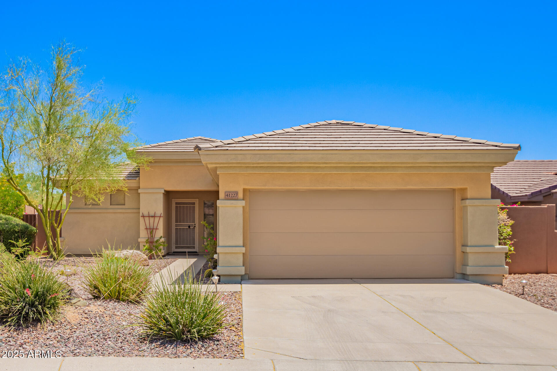 New price!! Welcome to this stunning Dover Expanded floor plan located in the prestigious Anthem Country Club! This well maintained 2 bd, 2 ba residence offers a spacious and open great room, perfect for entertaining and everyday living. The expanded layout enhances the flow of the home, creating a bright and inviting atmosphere. Backyard backs to open space and is ready for your personal touch. Enjoy access to the world-class amenities including championship golf courses, state-of-the-art fitness centers, resort style pools, tennis courts, dining, all within a secure, gated community. Also included is Parkside's pickleball courts, community center, and water park. A beautiful community to fit any lifestyle.