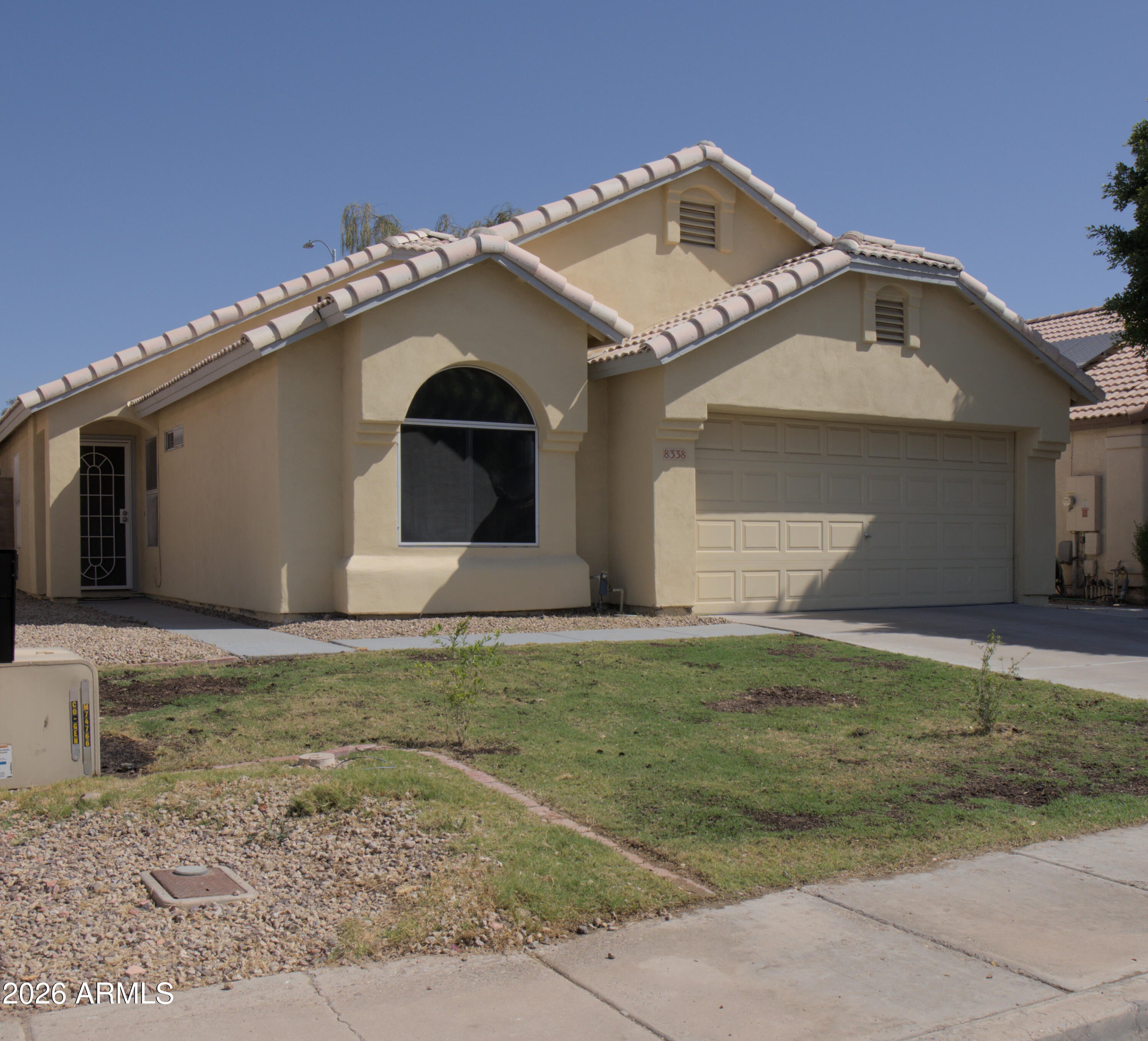Charming 3 bed 2 bath home with 2-car garage in Peoria - No HOA. Move-in ready with an open-concept layout connecting the family, dining, and eat-in kitchen areas. Features include stainless steel appliances, plus included washer, dryer, and refrigerator. The primary suite offers a walk-in closet and step-in shower. Enjoy a private backyard with covered patio and high block fencing.