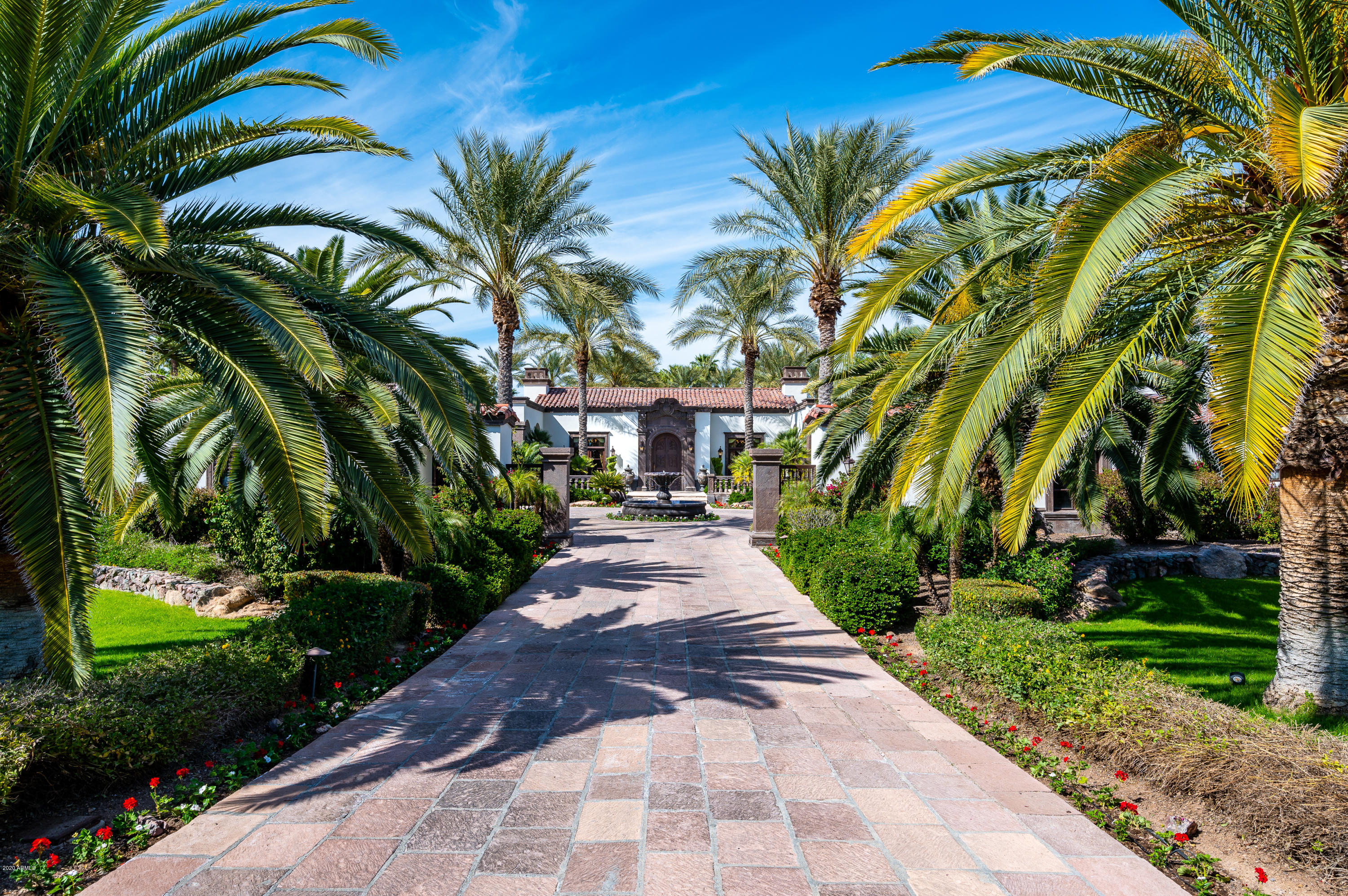KNOWN AS THE JEWEL OF JUDSON, THIS FIVE BEDROOM EIGHT BATHROOM ESTATE IS THE RESULT OF A COLLABORATION BETWEEN ARCHITECT TIMOTHY BROWN AND BUILDER AARON RODRIGUEZ AND IT WAS INSPIRED BY THE JOURNEY THEY TOOK TOGETHER THROUGH MEXICO FROM GUADALAJARA TO THE MOUNTAINS OF SAN MIGUEL ALLENDE. 

AS WE ENTER THE GRAND LIVING ROOM DINING ROOM WITH BEAUTIFULLY ILLUSTRATED ELLIPTICAL CEILINGS, WE BEGIN TO SEE SOME OF THE MOST BEAUTIFUL BAROQUE ELEMENTS OF SPANISH COLONIAL ARCHITECTURE.

Marble floors, hand hewn furniture quality cabinetry, leaded glass windows, retractable glass doors open to resort courtyard pool and patios at the touch of a button. Outdoor kitchen, fireplace, serenity gardens, sport court and koi pond.Extraordinary chef's kitchens open to the family room with double islands, double sinks, double dishwashers, butler's pantry and wine cellar. Magnificent douglas fir exposed structural beams grace the kitchen and family room. Just off the family room is an intimate private theater for eight.

Guest house at northernmost end of rear grounds. Guest quarter to the south has a private entrance off the courtyard/motor court. 

Interior Design By Tina O