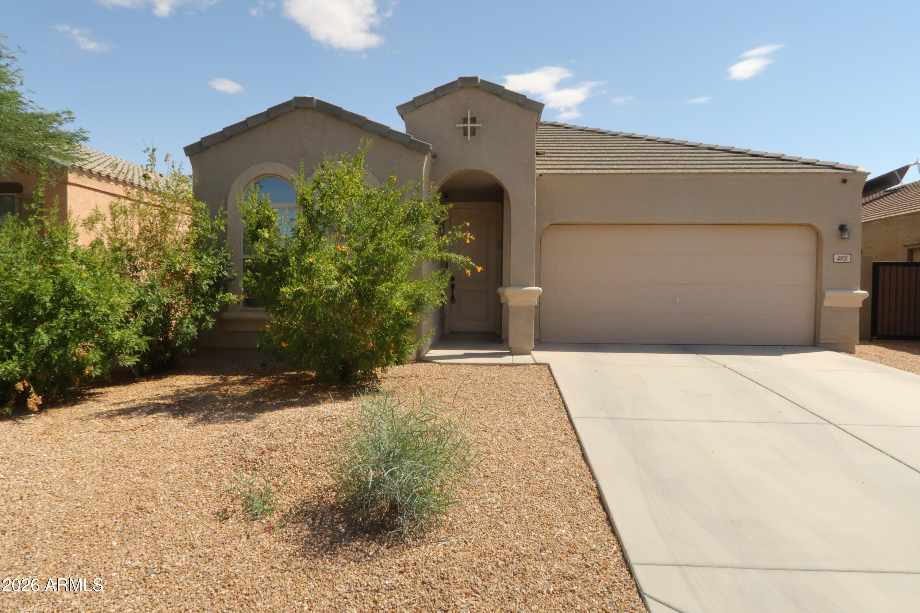Welcome home to this beautifully maintained 3-bedroom, 2-bath gem in the heart of San Tan Valley! This inviting single-story home features tile flooring throughout the entire home, offering both style and easy maintenance, along with ceiling fans in every room for added comfort year-round. The open-concept layout creates a bright and spacious feel perfect for everyday living and entertaining alike.

The kitchen comes complete with all appliances included, making this home truly move-in ready. Outside, you'll love the extended driveway with plenty of parking space and the low-maintenance backyard finished with decorative rock landscaping perfect for relaxing without the upkeep.

Conveniently located near parks, schools, shopping, and dining, this home combines comfort, functionality.
