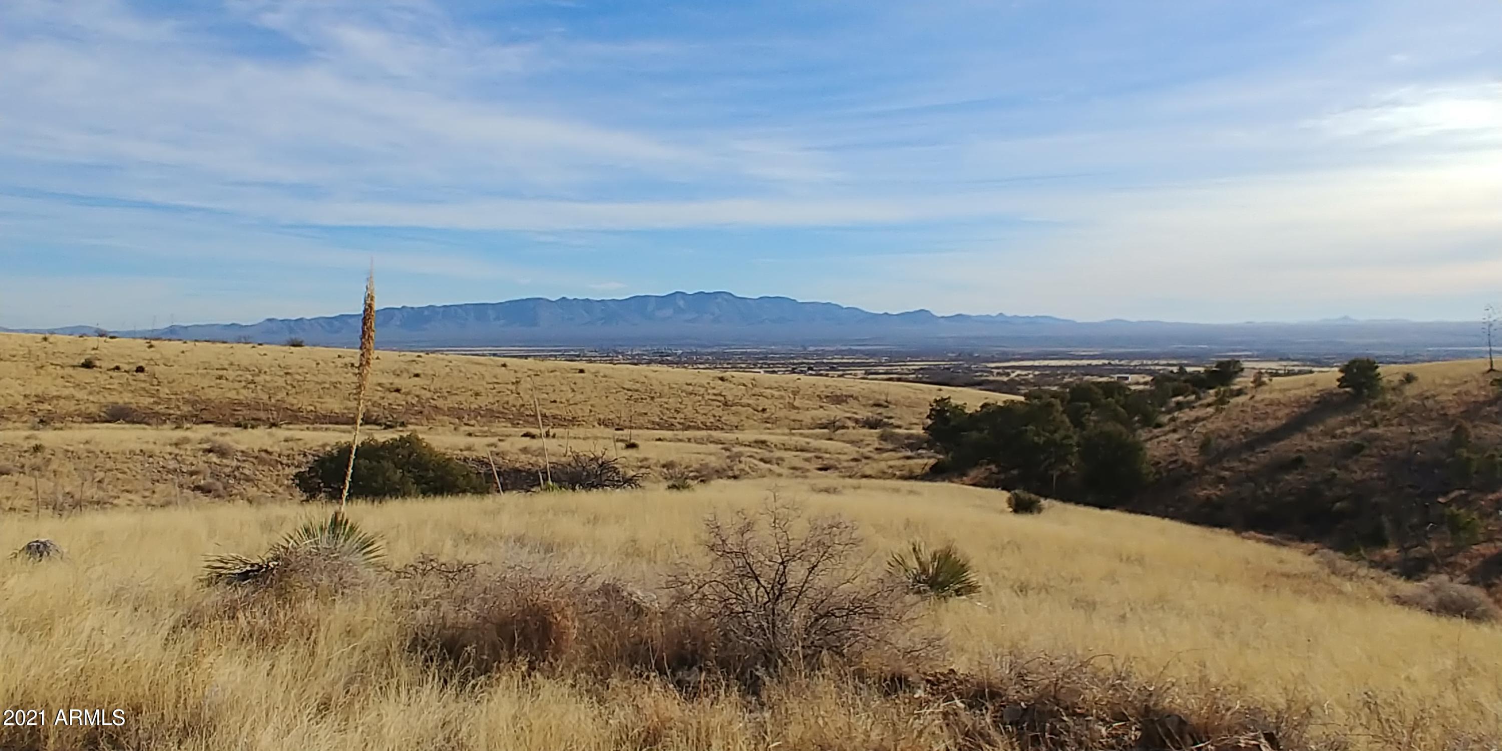 Are you looking for a gorgeous parcel to build your new custom home on? Look no further! There is already a pad cut in that is very private and takes advantage of the amazing views of the rolling hills and the lights sown in the valley at night. You will truly enjoy the sunrises here! Deer and other wildlife will be your visitors.  This property has a 1/4 well share . Do not wait or you will miss it!