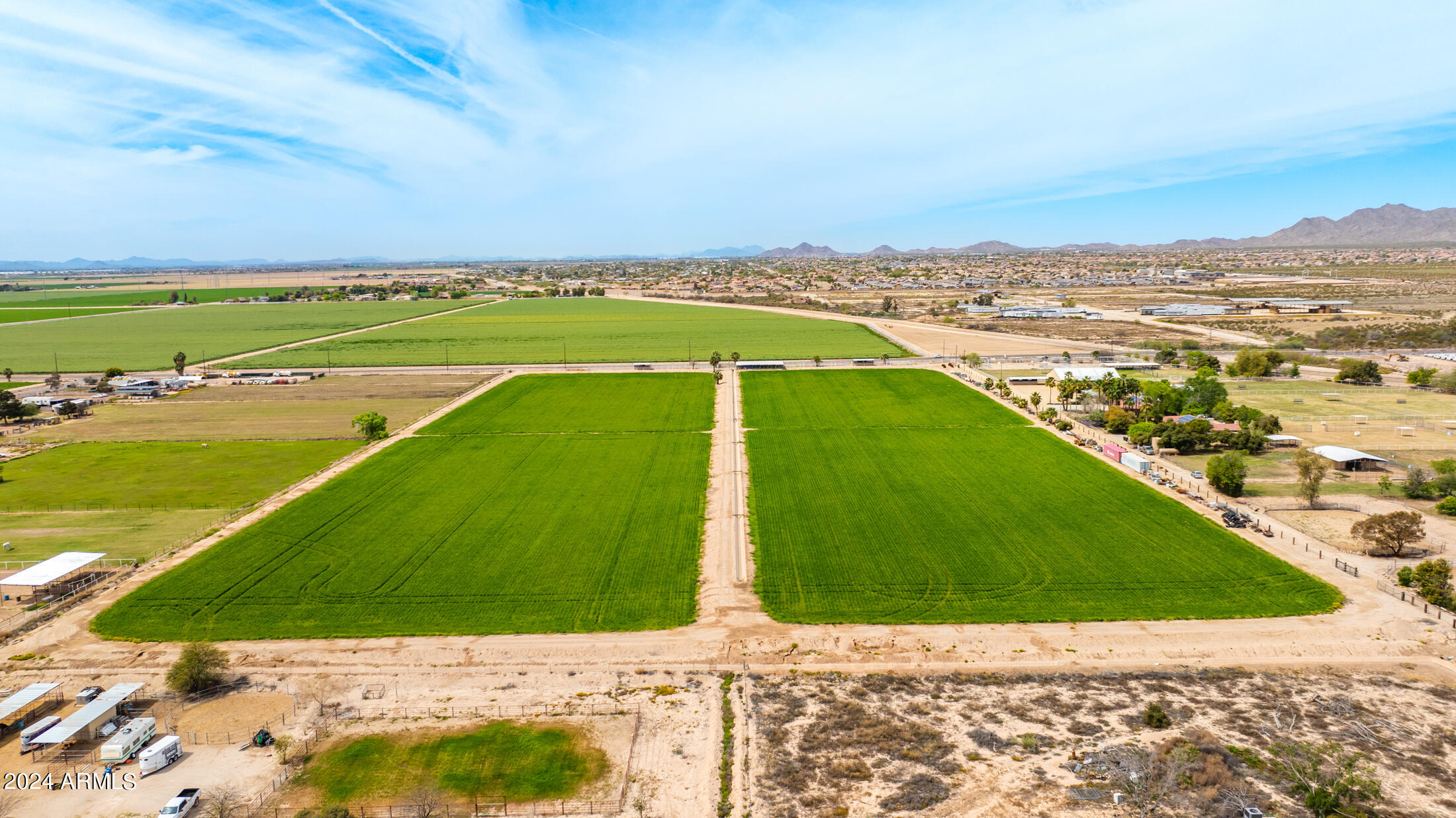 20 irrigated acres available in the fastest growing city in the country. The subject property presents an exceptional opportunity  for a housing development. Its location creates an optimal environment for multifamily, commercial and many other uses just minutes from ''The Landing'' near I-10 and Verrado Way. This area is primed to be the West Valley's newest entertainment, employment and residential hub.
