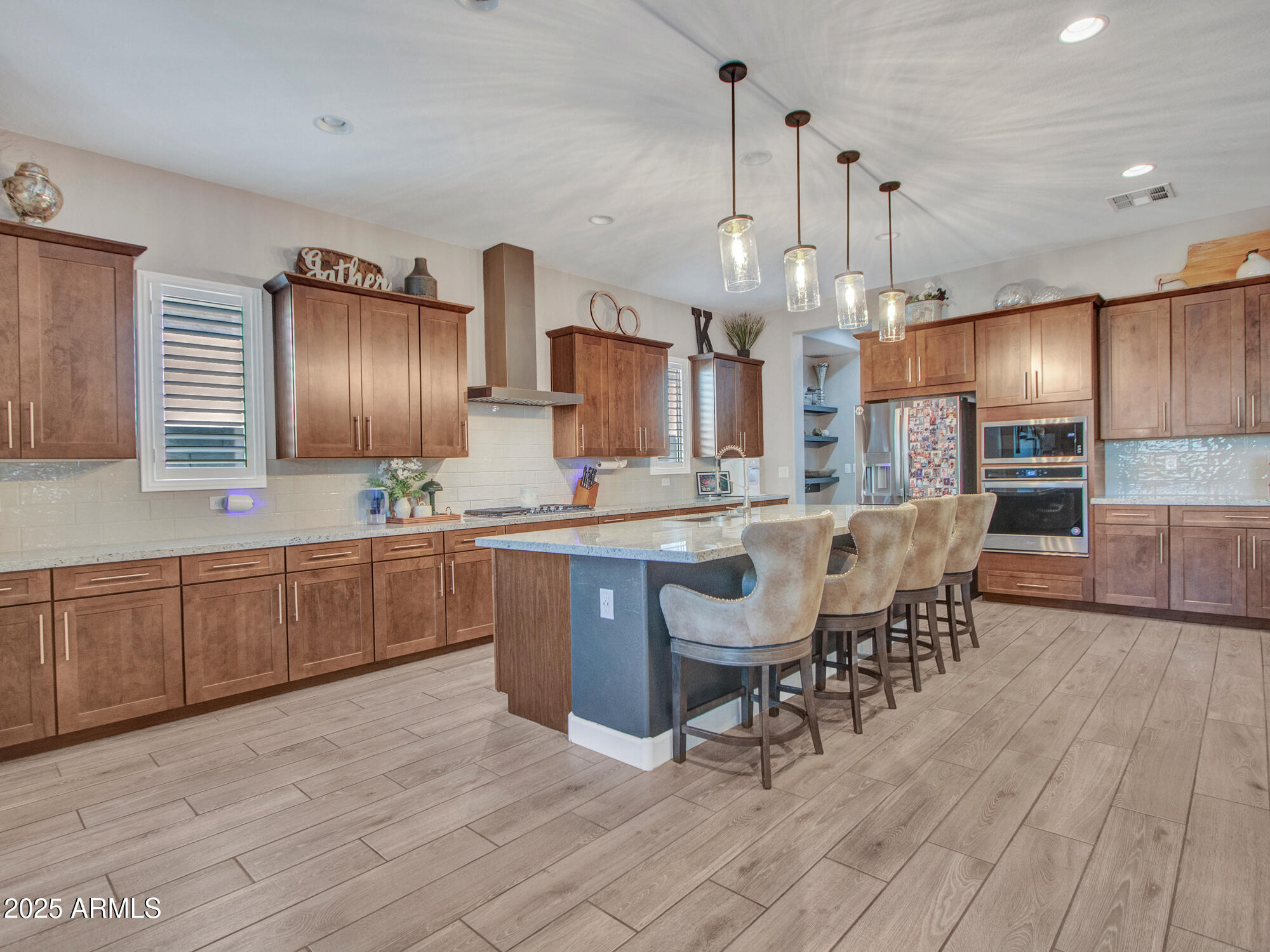 HUGE PRICE REDUCTION!! OWNED SOLAR (LESS THAN $100 IN ELECTRIC FOR ENTIRE YEAR!) and Tesla EV charging system! Stunning 2022 home with 4-bedrooms, 3.5-baths, and 3,430 sq. ft. of luxury living, PLUS an office and  additional bonus room, perfect for today's flexible lifestyle. Gourmet kitchen is a chef's dream with two walk-in pantries, a butler's staging area, and gorgeous cabinets. The great room flows seamlessly from kitchen and breakfast area, and features beautiful custom built-ins. The primary suite also includes crafted built-ins and en suite bath. Laundry room is complete with a sink, linen closet, and ample cabinetry. High-end finishes, designer lighting and ceiling fans, and plantation shutters throughout. The 3-car garage is equipped with built-in storage cabinets and EV charger. relaxing, kids play-yard and entertaining. Every detail in this home has been curated for comfort, style, and modern living.