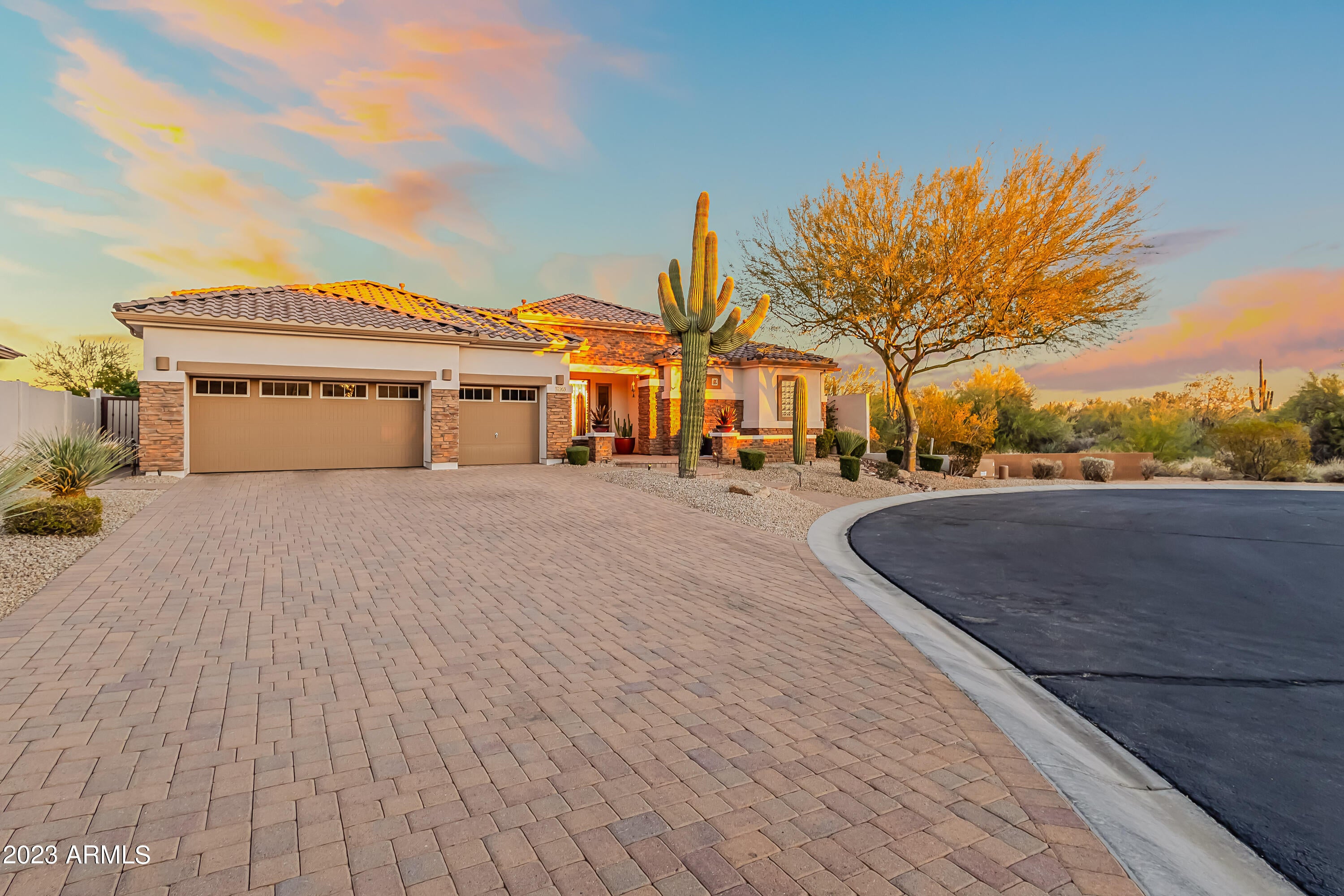 On a cul-de-sac in gated Lone Mountain Estate, this 3 bed, 3 bath home has high ceilings with crown molding, formal dining, & eat-in kitchen with upgraded Subzero refrigerator, Asko dishwasher, & new backsplash. With a split floorplan, the primary suite includes natural light from oversized windows, dual sink vanity, enlarged shower, separate bathtub, and walk-in closet with built-in storage. Backyard is perfect for entertaining with solar heated pool, covered patio with misting system & automated drop-don shades, built-in BBQ with gas firepit, indoor/outdoor surround sound system, & new turf, exterior lighting, travertine & desert landscaping. Add'l rooms include office, great room, and family room. Added upgrades include Anderson windows with warranty, tankless water heater, & newly painted exterior with stone décor. Three stall garage with storage cabinets & racks, epoxy floors, & exterior RV parking. Close to the best golf, hiking, and top restaurants in Cave Creek.