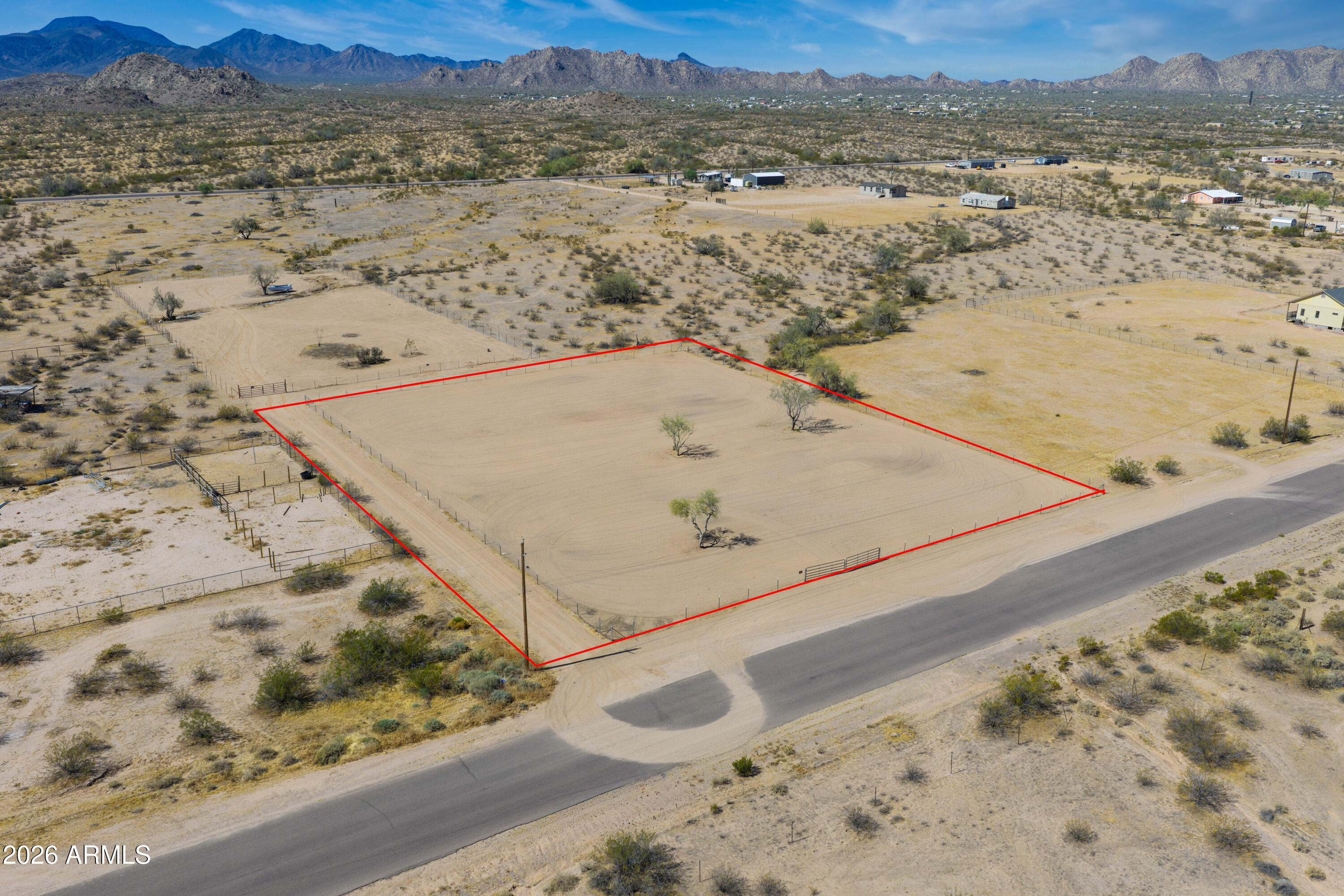 With Paved Road access and Beautiful Mountain Views this fully fenced lot is perfect to build your Dream Home/Ranch or can also be set up with a Manufactured Home and/or Barn. The location is close to HWY 84 with Shopping available in both Stanfield and Casa Grande or you can take HWY 347 and head to Harrah's Ak-Chin Casino, Ak-Chin Multi-Entertainment Center, Copper Sky Park or go Shopping in the City of Maricopa!