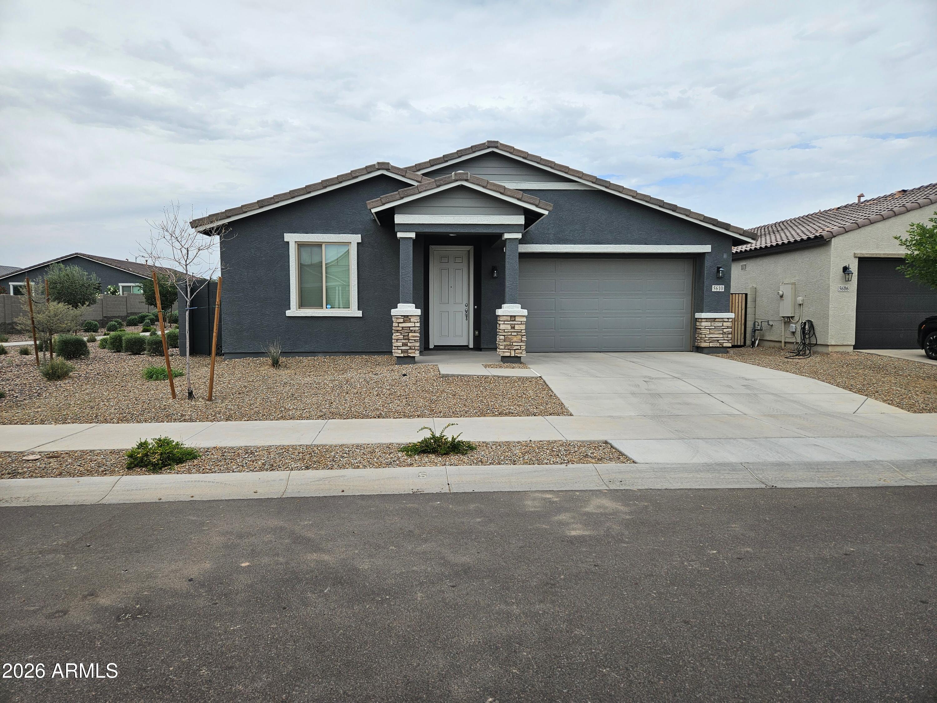 Experience modern living in this stunning 2023-built single-level gem. Situated in a prime location adjacent to a scenic walking trail, this home boasts premium upgrades throughout. The open-concept interior features sleek, all-tile flooring for easy maintenance and a contemporary feel. The gourmet kitchen is a chef's dream, complete with elegant granite countertops and high-end stainless steel appliances. A perfect blend of style and convenience!