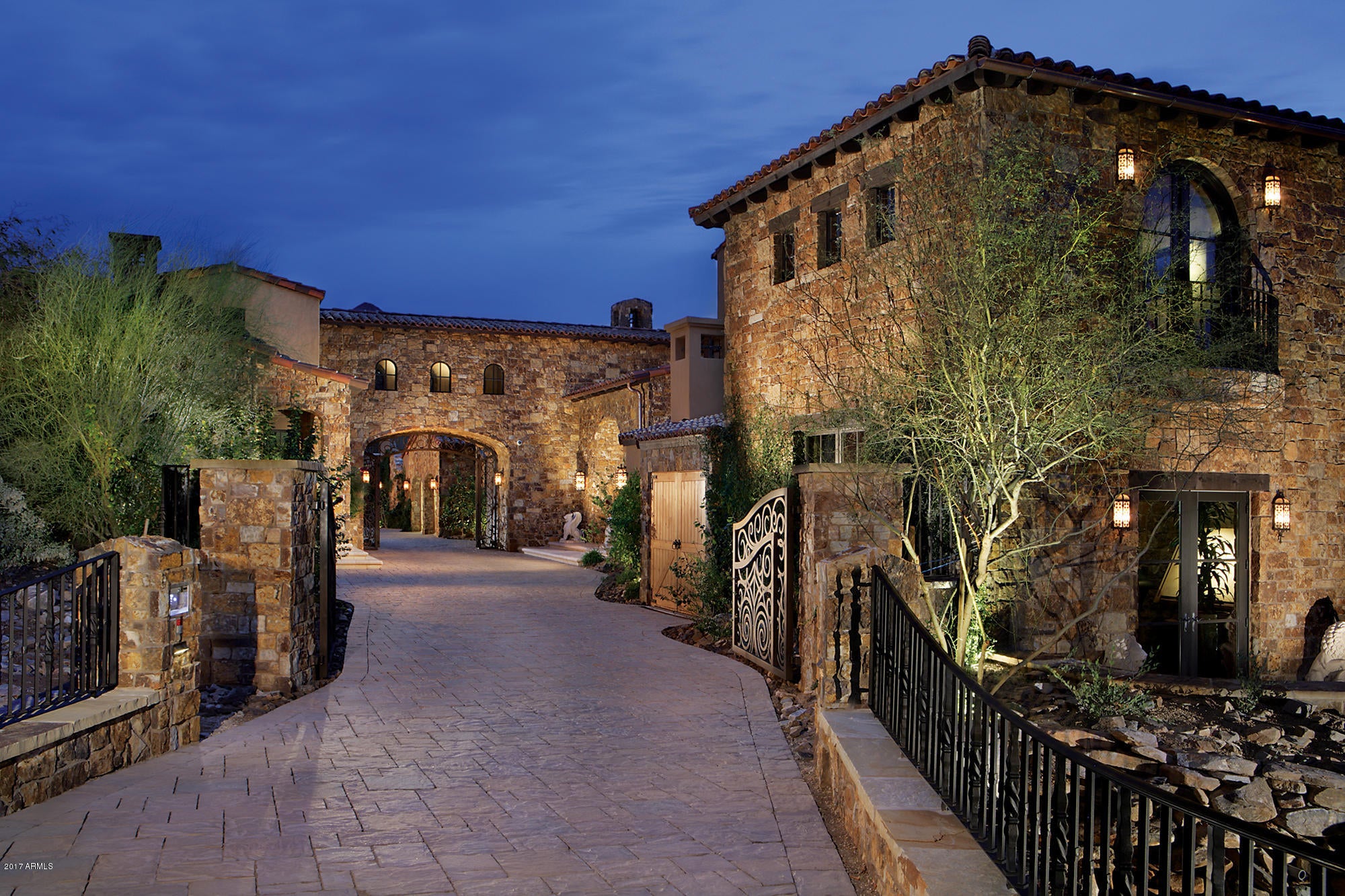 This private Tuscan Estate is located in the upper canyon of Silverleaf. The homes grand entrance overlooks the magnificent southern skyline w/ more spectacular views throughout the home. W/ over 13000 sq.ft. this home has seven bedrooms, nine full baths, four half baths & a separate casita w/ living room & kitchenette. The large top of the line chefs kitchen is great for entertaining. The mix of stacked stone, travertine & beautifully detailed wood is tastefully strewn throughout the home. Cool off in the glass tile pool while barbecuing on the wrap around back patio. If you have a passion for cars the six high tech garage spaces w/ paved auto court will impress! And it doesn't stop there! Entertainer's dream in the downstairs game room w/ movie theater, billiards, air hockey & wet bar!