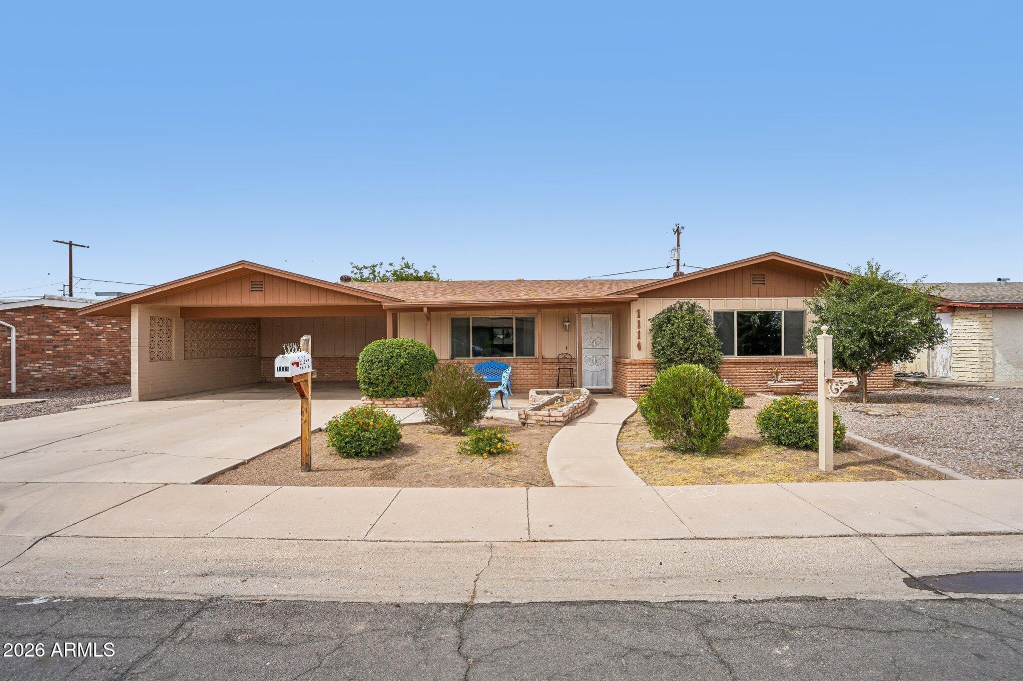 This welcoming Casa Grande home offers a smart and comfortable layout from the moment you step inside. A formal sitting room greets you upon entry before opening into a bright open concept living area that flows into the kitchen and main dining space. The primary bedroom offers an ensuite bath and direct backyard access, while two additional bedrooms provide added flexibility. Outside, the fully fenced yard delivers a large partially covered patio and greenspace perfect for Arizona's beautiful weather.
Solid dining is close at hand with BeDillon's Restaurant, Hideout Steakhouse and BBQ, and Big House Cafe covering everything from breakfast to a special night out. Promenade at Casa Grande puts shopping and dining in one convenient spot nearby.