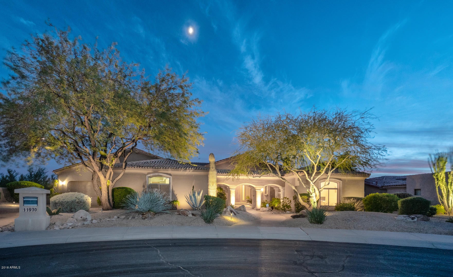 THIS HOME WILL IMPRESS FROM THE MINUTE YOU ENTER! FABULOUS VIEWS OF CAMELBACK AND THE CITY LIGHTS FROM THE BACK AND UP CLOSE AMAZING MOUNTAIN VIEWS FROM THE FRONT. EVERYTHING IN THIS HOME IS UPGRADED. CHEF'S KITCHEN WITH VIKING, GRANITE, CUSTOM CABINETS AND WALK-IN PANTRY. A BEAUTIFUL WALK IN BAR WITH 852 BOTTLE WINE CELLAR. IN ADDITION TO 4 LARGE BEDROOM SUITES THERE IS A SEPERATE MEDIA/THEATER ROOM. THE MASTER INCLUDES SITTING AREA WITH FIREPLACE, HIS AND HERS WALK-IN CLOSETS, VANITIES AND WATER CLOSETS, CUSTOM CABINETS IN THE BATH AND AN EXERCISE/BONUS ROOM. A TRUE RETREAT! THE BACKYARD HAS A GAS FIREPLACE WITH SITTING AREA TO TAKE-IN THE VIEWS AS WELL AS BUILT IN BBQ. A MISTING SYSTEM FOR THE HOT SUMMER DAYS AND HEATED POOL FOR THE WINTER. SEE DOCUMENTS TAB FOR UPGRADE LIST.