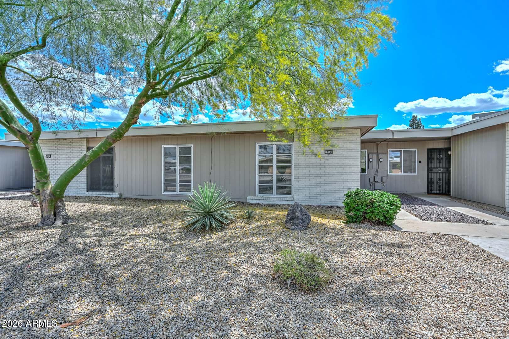 Welcome to easy, low-maintenance living in the heart of Sun City. This beautifully updated 2-bedroom home offers a bright, open layout with a spacious living and dining area, plus a charming breakfast nook just off the kitchen. Enjoy tile in all the high-traffic areas. The updated bathroom is a standout, featuring a walk-in shower designed for both comfort and convenience. Generously sized bedrooms and laundry room with ample storage add to the home's practicality.
Step outside to your private, cozy courtyard-style backyard, complete with a covered patio--perfect for morning coffee or relaxing evenings--and designed for easy maintenance. Ideally located within walking distance to Sun City's sought-after amenities, including pools, spa, fitness center, tennis courts, and golf.
