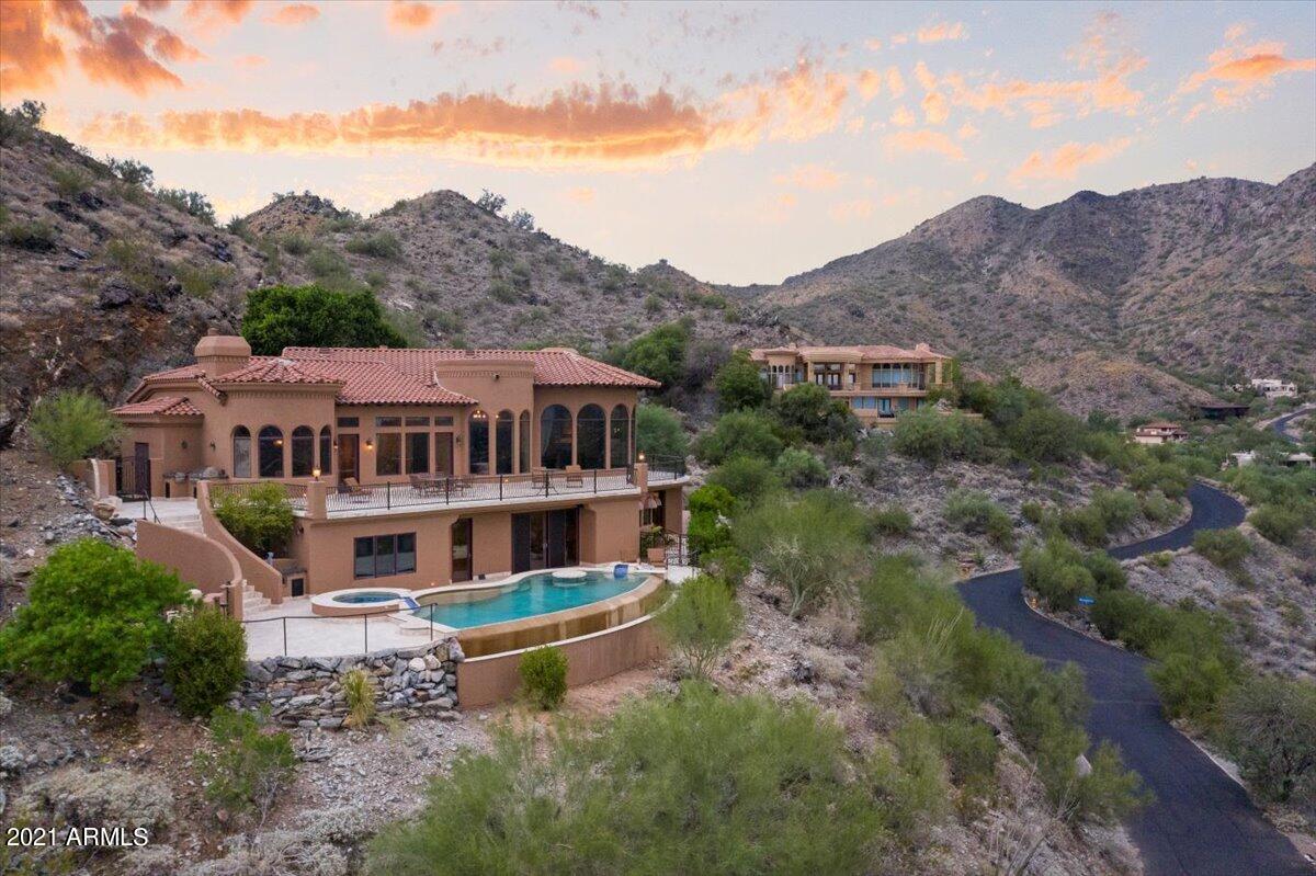 Welcome to Villa Feroce! Stunning Paradise Valley masterpiece with arguably the best views and complete privacy. NO HOA! Situated atop Mummy Mountain on over 1.7 acres, this 4 bedroom 5 bathroom custom built home includes a guest casita with a private entrance, multiple fireplaces and outdoor firepit complete with built in BBQ & pizza oven, a  perfect setting for entertaining! Backing onto the hillside and boasts north facing views, newly remodeled patio decks, negative edge pool and spa, new AC units (2020), 6 burner gas cooktop, 2 dishwashers, Control 4 surround sound system & so much more!  EXCELLENT investment/income opportunity! Located within minutes of the Ritz Carlton, Paradise Valley Golf & Country Club, restaurants, shopping & all that Paradise Valley has to offer.