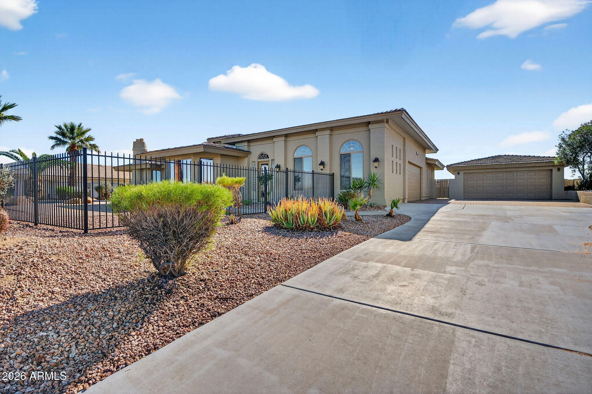 Completely renovated from top to bottom, this exceptional Fountain Hills estate offers all-new finishes and true single-level living with no interior steps throughout. Upon stepping inside a dramatic 6x8 ft pivot front door, you are welcomed by an impressive foyer featuring soaring 18 ft ceiling and an elegant chandelier, setting the tone for the refined design found throughout the home. The home features an abundance of windows, adding exceptional brightness and an airy, open feel throughout. 

Spanning 3,888 sqft (including a 350 sqft addition that could be used as an additional bedroom, library, home gym, or flex space), this 3-bedroom, 3-bath home maximizes comfort, functionality, and breathtaking views while maintaining a seamless indoor-outdoor flow ideal for Arizona living. Every room offers a walk-in closet, while the primary suite is enhanced with his-and-her walk-in closets and skylights in the master closets, bringing in even more natural light.

Take in sweeping panoramas of Four Peaks, Fort McDowell, Red Mountain, and the iconic Fountain from multiple living spaces. The desirable floor plan features expansive living areas, formal dining, and a versatile bonus room  framed by stunning mountain scenery. 

The kitchen is beautifully appointed with tasteful modern finishes like a new stainless steel professional grade appliances (67x78 refrigerator, combo microwave oven, wine cooler), a striking quartz island, and a spacious walk-in pantry,

The primary suite is a private retreat, offering its own fireplace, separate sitting area, and a bathroom with dual vanities, soaking tub, and separate rain shower. 

Outdoor living shines with a resort-style pool with poolside bathroom, new pool deck (updated 2026), barbeque, and mini golf course. The pool is equipped with a variable-speed pump (added in 2026) and can be heated with the addition of a heating component for extended seasonal enjoyment.

Additional upgrades include pre-plumbing for a water softener, an instant hot water circulation pump for added efficiency and convenience, and 72 inch ceiling fans in living and family room.  

Ample parking is provided with both attached and detached garages  offering EV charger, 4 car garage and 6 slab parking. Both garages are 18x8 and private gate surrounding the home. 

This move-in-ready home delivers unmatched views, thoughtful design, and effortless single-level living! Situated on 100% flat, fully usable land -- a rare find in Fountain Hills where many homes are built on sloped or hillside lots. This residence offers level-ground living with easier access, more functional outdoor space, and greater flexibility for future enhancements.

NO HOA telling you what you can and can't do! 

Please note: select rooms have been digitally enhanced with premium virtual furnishings to showcase the scale and versatility of the living spaces