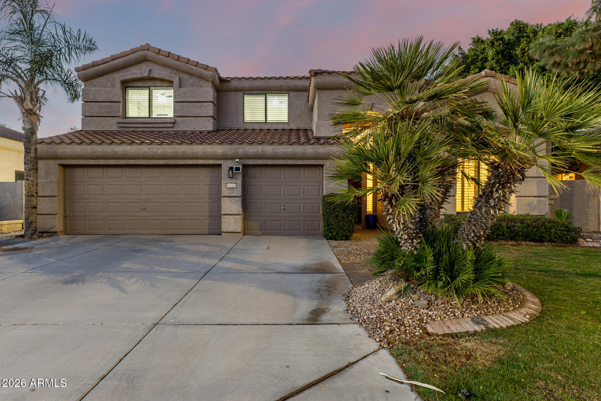Welcome to Chandler's most exclusive waterfront communities in Ocotillo. The home boasts an eloquently updated kitchen w/ spectacular views of the lake. Spacious kitchen w/ quartz countertops and gorgeous backsplash. Lower level has a large family room and dining room with vaulted ceilings and a beautiful staircase. Large luxurious Primary suite is situated on the lower level w/ great views of the lush backyard including new pavers throughout in 2024 and sparkling lake and tastefully updated bathroom. Upper level includes 3 bedrooms and a spacious loft which looks out to the oasis like backyard w/ great views. Come visit this amazing home in the very desirable neighborhood of Ocotillo Lakes, near top rated schools, shopping and fine dining.