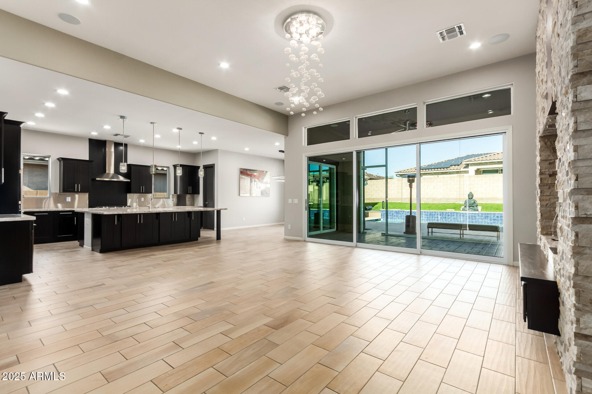 Welcome to this stunning single-story home with POOL situated in a prime CORNER LOT! The beautifully manicured landscape, 2-car garage & RV gates are just the beginning. Step inside to find bright and inviting living spaces that seamlessly blend style and comfort, showcasing wood-look floors, soaring ceilings, contemporary lighting, plenty of natural light, sliding doors overlooking the pool, and a neutral palette. The gourmet kitchen comes equipped with recessed lighting, staggered cabinets, granite countertops, SS appliances, and an island with a breakfast bar, perfect for entertaining. Get a good night's sleep in the main retreat, offering a spa-like bathroom with double vanities and a separate shower & tub, and a closet. A gazebo with a built-in BBQ, a sparkling pool. Make it yours! time. What's not to love? Make it yours!