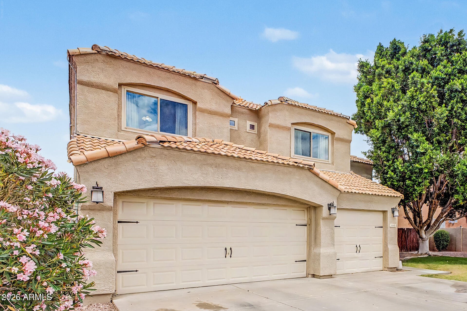 Welcome to the highly sought-after Sierra Ranch community, known for its wide streets and inviting atmosphere. This beautiful 5-bedroom, 3-bath home offers the perfect blend of space, comfort, and functionality. Situated on a large lot, the backyard is an entertainer's dream with a sparkling pool and plenty of room to enjoy Arizona living. Inside, you'll find soaring vaulted ceilings and an open, light-filled floor plan that creates a warm and welcoming feel throughout. The home features a desirable layout with one bedroom and a full bathroom on the main level, ideal for guests or multi-generational living, plus generously sized, oversized bedrooms. The kitchen and bathrooms have been tastefully updated, adding modern style and convenience. Additional highlights include a 3-car garage and fully paid-off solar, helping keep energy costs low. Located in a prime area near the US-60 and Loop 202, you'll have easy access to shopping, dining, and everyday amenities. This home checks all the boxes, space, upgrades, location, and lifestyle. Don't miss your opportunity to make it yours!
