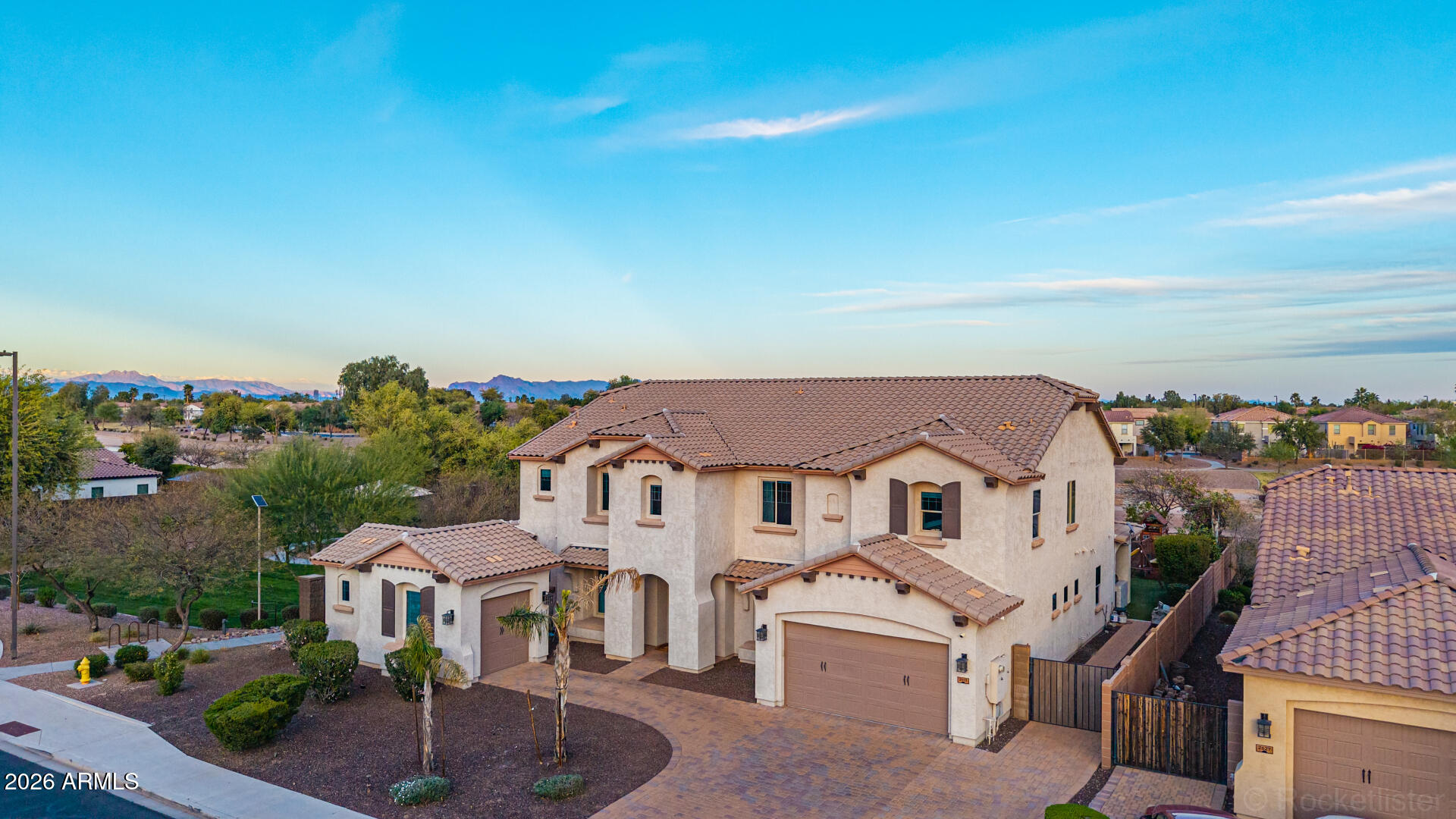 Exceptional luxury residence in the highly sought-after Estates at Velvendo, offering rare privacy and premium positioning backing to the canal with only one neighboring home, while a park borders the left side of the property.

This customized Meritage home showcases light, bright finishes and thoughtfully designed living spaces throughout. The expansive great room opens seamlessly to the breakfast area and a beautifully upgraded chef's kitchen featuring marble and granite countertops, stunning herringbone wood flooring, a spacious pantry, Sub-Zero refrigerator, and Wolf appliances, creating the perfect space for both everyday living and entertaining. A spacious dining area and custom office complete the main living level. The luxurious primary suite offers a true retreat with a sitting area, dual vanities, a steam shower, jetted soaking tub, and two generous walk-in closets.

The separate kids' wing provides exceptional space and functionality with a massive loft complete with kitchenette, five spacious bedrooms with large walk-in closets, a theater room, and abundant storage throughout.

Convenience is maximized with laundry rooms located both upstairs and downstairs, and the washer and dryer are included.

Step outside to the highly upgraded backyard designed for entertaining and relaxation, featuring a stunning glass tile pool with slide and a heater and chiller! There is artificial turf, expansive patio space, and a dedicated spa hookup ready for installation. With canal views behind the home and a park bordering the side yard, this property offers a level of privacy rarely found in the community.

Countless upgrades throughout. A rare opportunity in one of the area's most desirable neighborhoods. This won't last long!