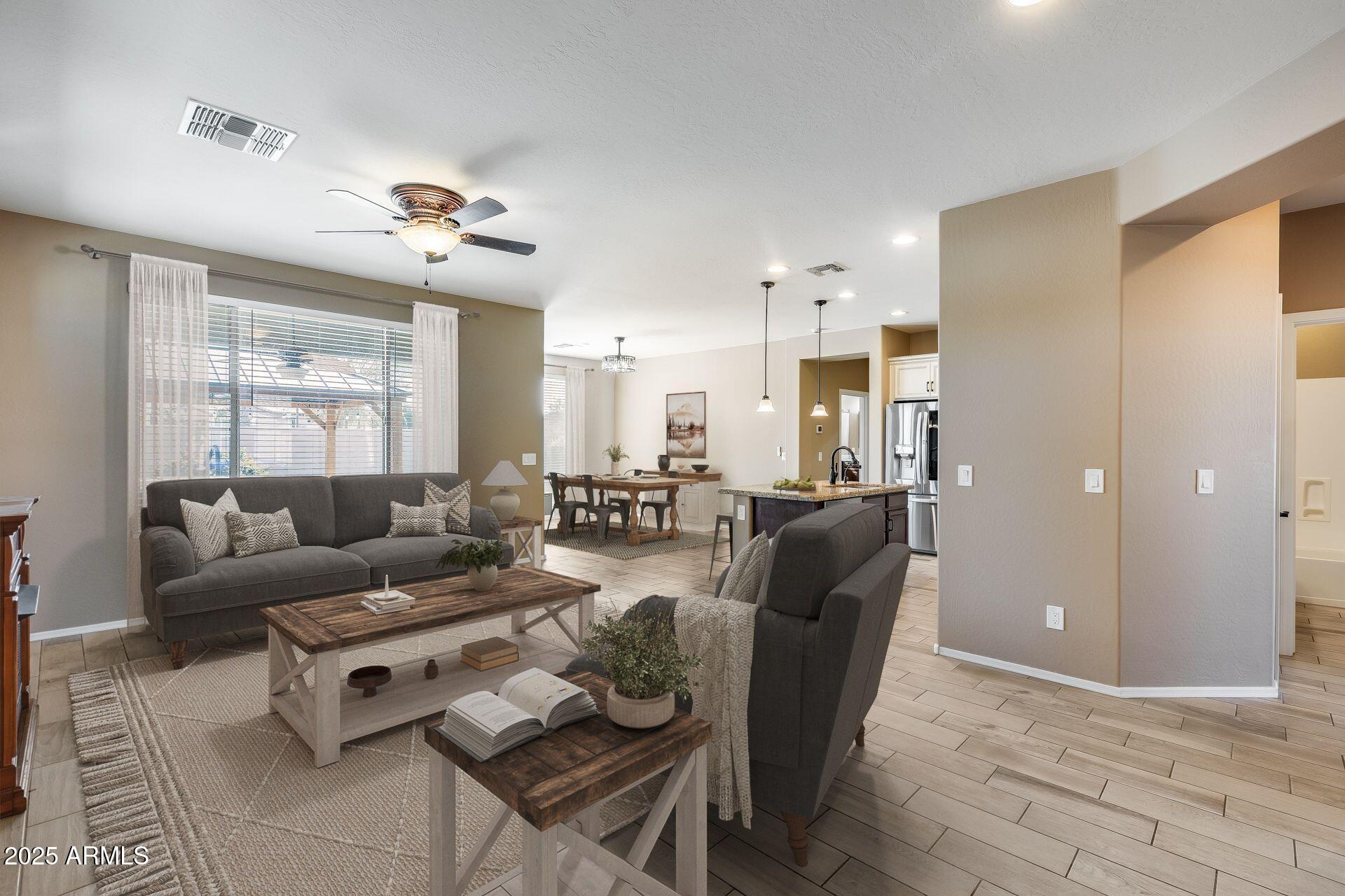 Perfectly positioned on a desirable corner lot within an exclusive gated 55+ lake community, this 3-bedroom, 2-bathroom home combines comfort and elegance at every turn. The bright and inviting interior showcases soaring ceilings, wood-look tile flooring, and energy-efficient low-e windows. The kitchen is a showstopper with granite countertops, a stylish tile backsplash, custom cabinetry, a center island, and a breakfast bar for casual dining. Additional features include a cozy fireplace, doggy door, water softener, and RO system. The primary suite boasts a newly renovated en suite bathroom for modern luxury. Step outside to your own private backyard retreat, complete with a charming patio and above-ground spa—ideal for relaxing or entertaining. The home features financed solar with $103.85 monthly payments and only $17K remaining balance. Enjoy access to incredible community amenities, including a clubhouse, heated pool and spa and tennis courts. With close proximity to walking trails and picturesque lakes, this home delivers the ultimate lifestyle of luxury and leisure!