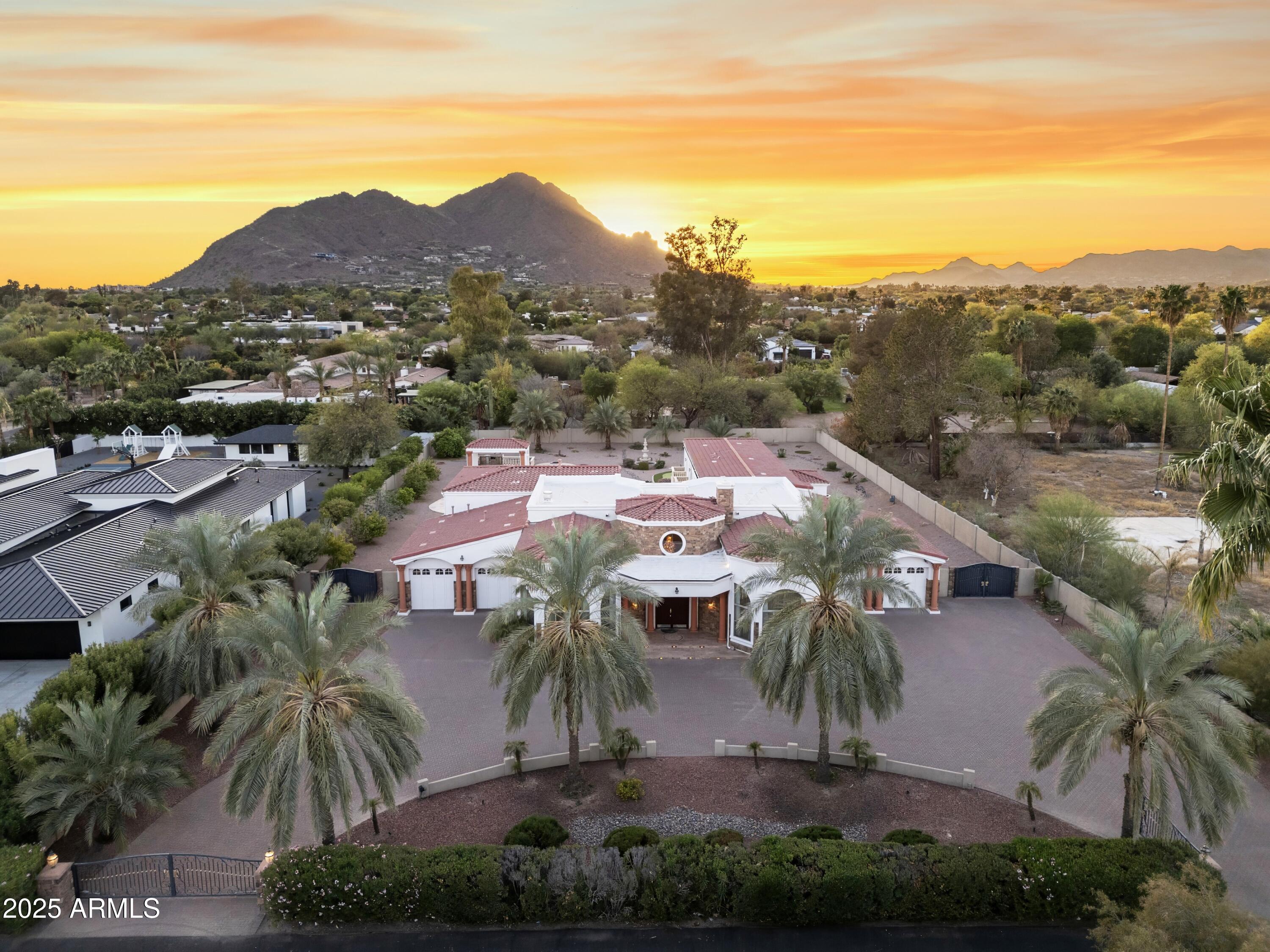Opportunity :: with the ability in leasing and generate revenue until you're ready to reimagining it for-profit. The CUL-DE-SAC location will soon be surrounded by new, and newer builds. With nice size lot dimensions,  huge livable square foot and Camelback Mountain views in place; this all walled and gated lot can accommodate room to add a TENNIS, PICKLEBALL, SPORT COURT, LAP/PLAY POOL and or RV GARAGE. With NO HOA, all Utilities on site and conveniently close to Scottsdale, Camelback and Lincoln...  easy access and checks all the boxes; welcoming back up offers; don't miss out!!