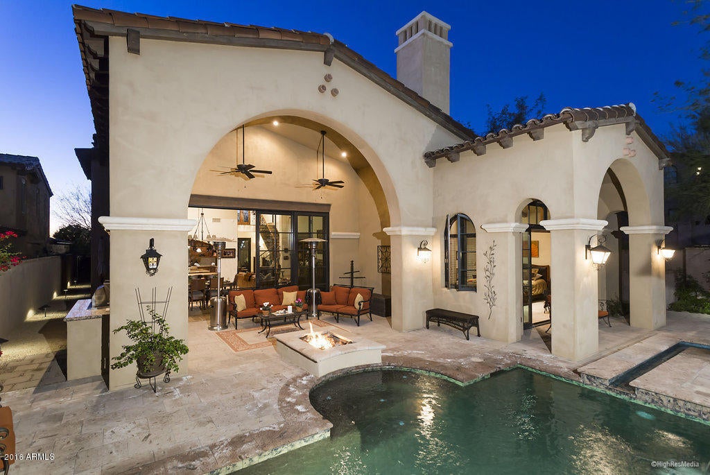 BEST VALUE IN SILVERLEAF. Located in the desirable Horseshoe Canyon with close proximity to the Silverleaf Club and Spa, this move-in ready Canyon Villa has it all. The spacious and upgraded great room with chef's kitchen, including three islands, is perfect for entertaining, while the media room/office, loft with kitchenette and three large guest bedrooms, complete this ideal floor plan. A large master suite on the main level has outdoor access to a serene patio space with a private spa, where you can enjoy the sounds of the babbling creek that runs adjacent to the property. Do not miss out on this opportunity to enjoy the lifestyle and ease of living that makes Silverleaf so special. Both at night and during the day, the home exudes charm, warmth and comfortable elegance.