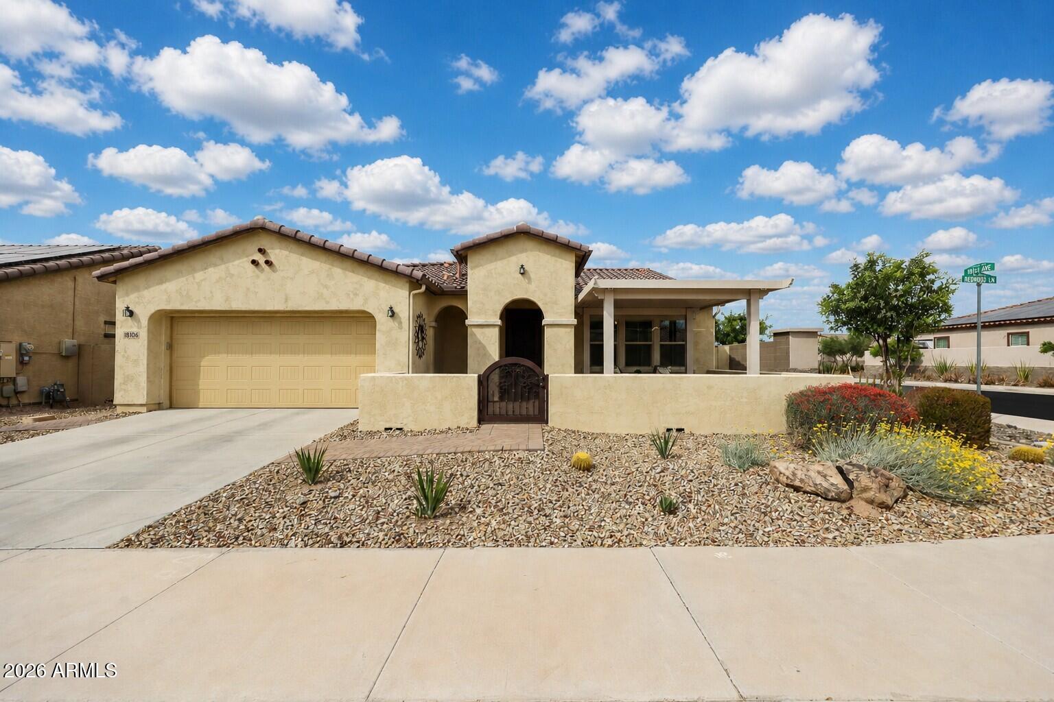 This is more than a home, it's a lifestyle designed for living well. Welcome to this highly upgraded Legato model thoughtfully designed for easy living & entertaining. Outside, a charming gated pavered courtyard with a pergola creates a warm welcome for all. This open-concept floor plan is versatile, featuring TWO true owner suites ideal for guests, multi-generational living, or a lock-and-leave lifestyle. A private office/den with built-in desk creates the perfect work-from-home space, complemented by a powder room. At the heart of the home is a chef-inspired kitchen with a sprawling island, upgraded cabinetry, granite, gas cooktop, and a XXL walk-in pantry designed for entertaining with ease. Exceptional Storage & designer Upgrades additional throughout adds to the home's functionality. Owner Suite #1 offers a spa-style bath and impressive walk-in closet, while Owner Suite #2 features dual sinks, Shower & large walk-in closet, giving each suite its own sense of privacy and comfort. Brand-new carpet adds a fresh, move-in-ready feel. The north-facing backyard, fully enclosed for privacy, is serene and low-maintenance, featuring an extended paver patio and grassy side yard on a desirable corner lot. A 3-car garage with built-in cabinets completes the package. Located within the award-winning active adult community of CantaMia at Estrella, residents enjoy resort-style living surrounded by mountain and lake views. The impressive 29,000-square-foot Village Center offers indoor and outdoor pools, spa, fitness center, yoga and aerobics studios, creative arts spaces, café, wine bar, and a full calendar of activities.
