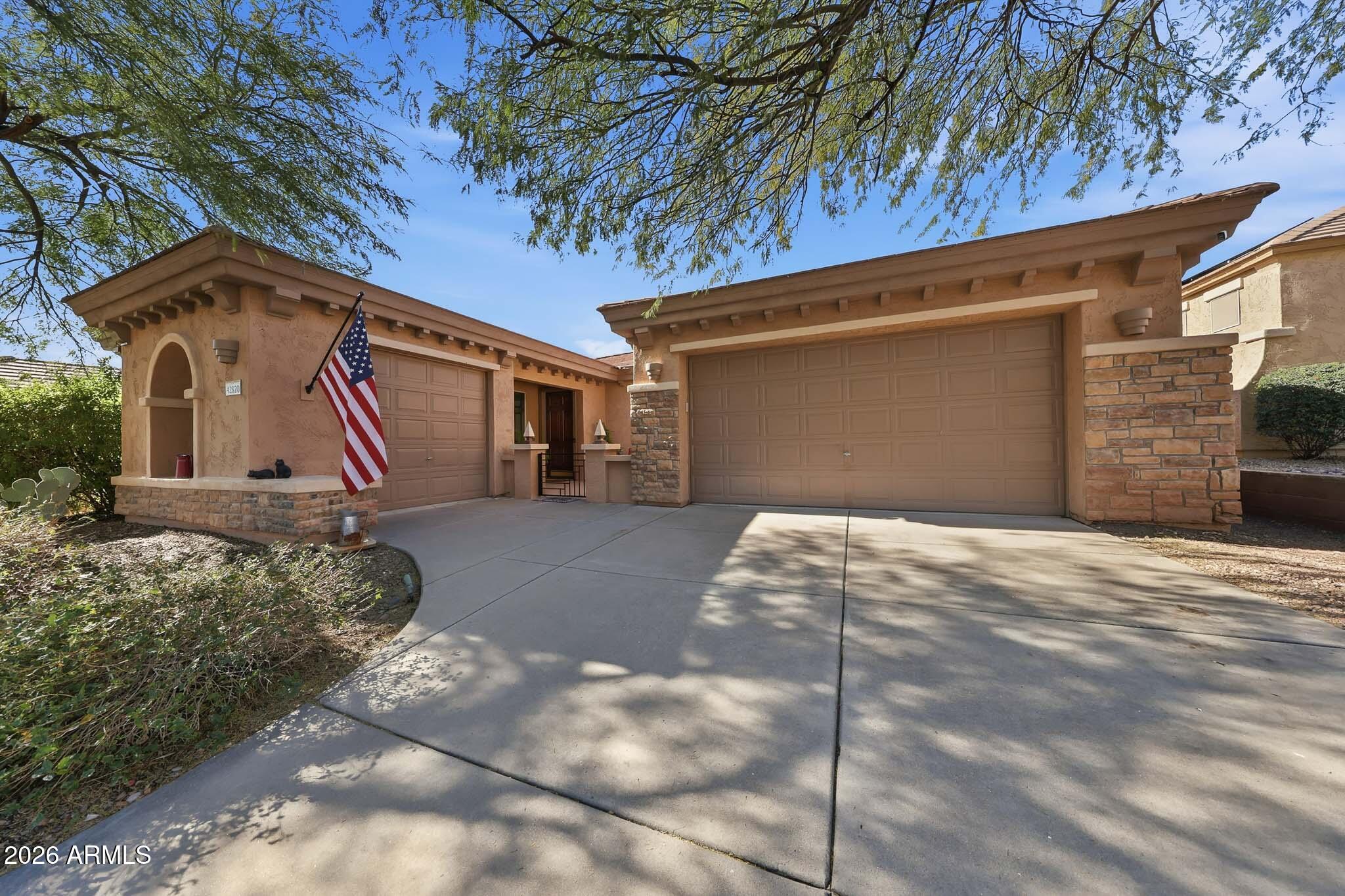 Welcome to this beautifully updated 4-bedroom, 2-bath home located in the highly desirable Anthem community. This light and bright floor plan offers inviting living spaces, modern finishes, and a cozy indoor fireplace perfect for relaxing evenings. The open layout flows seamlessly from room to room, creating a comfortable and functional space for both everyday living and entertaining.
Step outside to your own private backyard retreat featuring a refreshing spool and a charming patio area designed for Arizona living. Enjoy cool desert nights by the outdoor fireplace and plenty of space to unwind or host guests. Located in the award-winning Anthem master-planned community, residents enjoy access to parks, trails, top-rated schools, shopping, dining, and endless amenities. This home offers the perfect blend of comfort, style, and lifestyle.