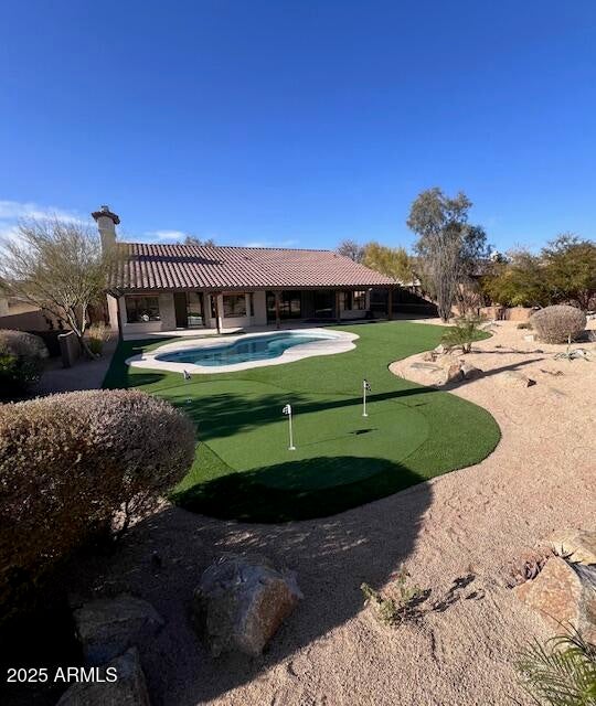 BRAND NEW EXTENSIVE REMODEL, DESIGNER FINISHES, KITCHEN, BATHS REDESIGNED, AMAZING NORTH SCOTTSDALE LOCATION. Stunning 4-bed, 2.5-bath, southwest contemporary home located in sought-after Pinnacle Peak Vistas offers a stylish and modern living experience. Updates include all NEW Thermador appliances, NEW roof and Trane AC unit, custom cabinetry throughout, wide plank European oak wood and designer tile, lighting and plumbing fixtures, epoxy garage floor and two new insulated garage doors and opener. Huge beautifully landscaped back yard with an inviting re-pebbled pool, artificial turf, putting green and large covered patio. Too much to list. Must See!