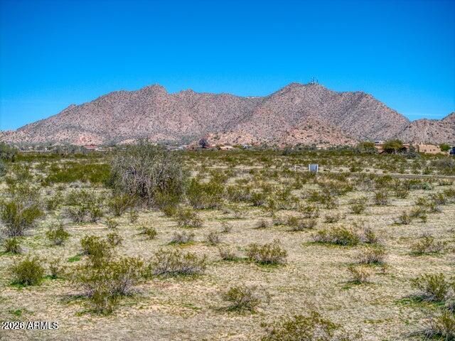 Gorgeous custom home 2.5 acre lot with electric and water to the property line. Beautiful view of the foothills and the city lights. Only ten minutes to town, shopping and hospitals, and I-10 inter change to Phoenix or Tucson.  Come build your dream home. Arizona Water company, and APS electric service the property.