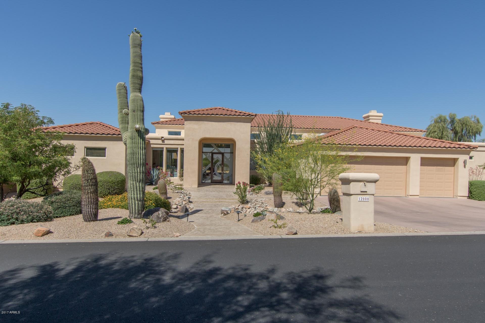 STYLISH & sophisticated CONTEMPORARY REMODEL. Unobstructed VIEWS of Camelback Mountain, Sonoran sunsets & city lights from nearly every room & the outdoor living space. Overlooking #15 tee in the exclusive guard-gated community of Ancala Country Club. Set on an elevated lot. Seamless 16' floor to ceiling windows along back of home. High quality cabinets & granite counters, Wolf & Thermador appliances, TWO Dishwashers, Subzero Refrigerator + 128 bottle Wine Chiller. Travertine floors. All NEW Kitchen flows into casual dining area with an extended Island & built-in table. Opens to Family Room. Owner's Suite features wide-plank wood floors + exquisite Classy Closet w/illuminated cabinets & shelves & large island w/locking drawers. Deluxe Guest Suite & secondary bedrooms are split on opposite side of the home. Control4 Home Automation System with three audio zones & wireless speakers. Centrally wired electronics closet and boosted WIFI signal from roof. Automated privacy shades on large windows. Home Gym adjacent to Family Room. Resort-style entertaining on the Covered Patio with Pool & Spa, Sunning deck, BBQ Island & al fresco dining. Fresh landscaping with pops of color from blooming desert botanicals & citrus trees. Beautifully designed for a comfortable, everyday lifestyle. Welcoming space for extended stay guests. Attention to quality detail in every aspect of the expensive remodel ... move-in ready. Call it home!