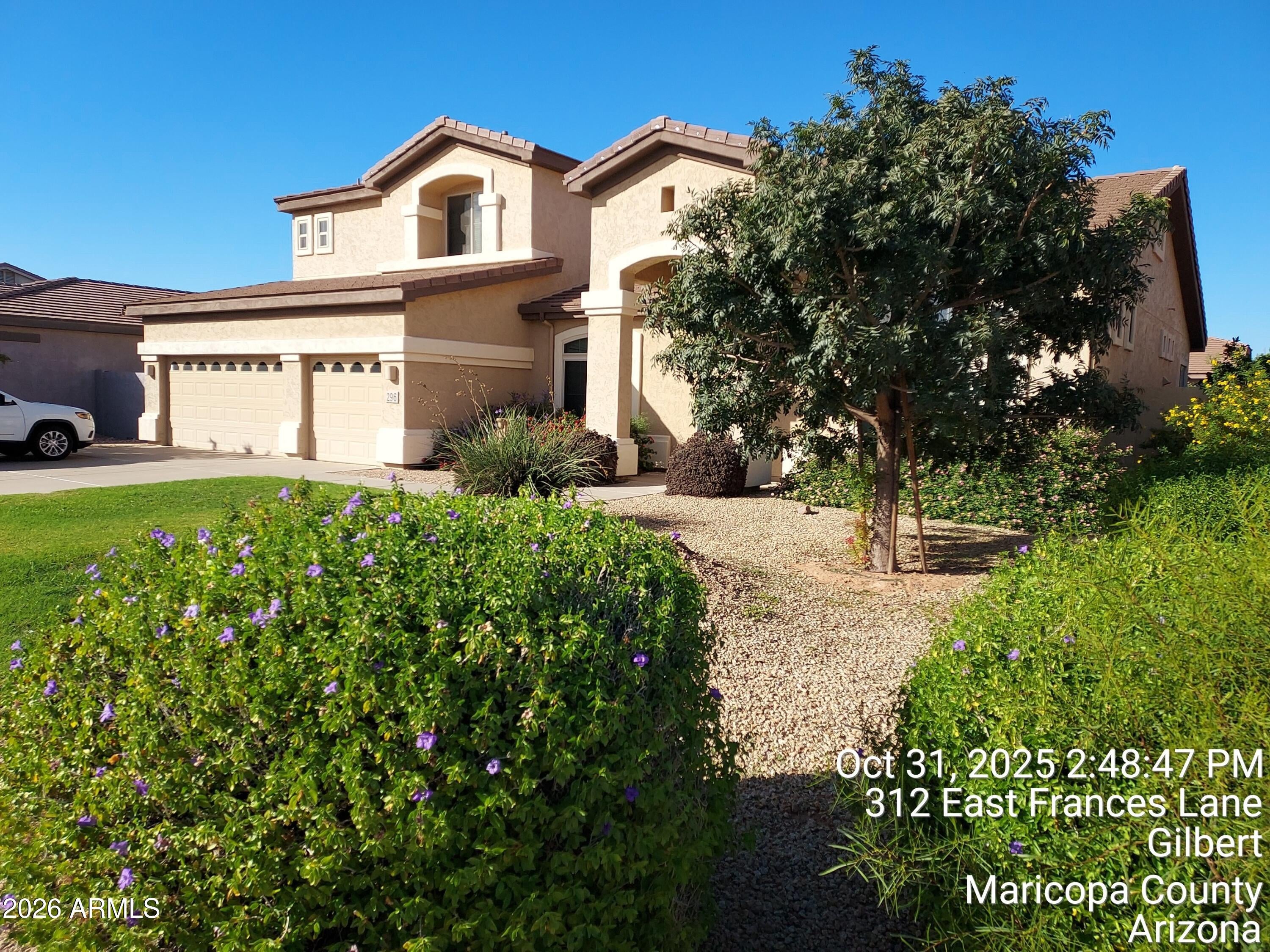 Spacious and beautifully updated. This 5 bedroom, 3.5 bath home offers over 4,000 sq. ft. of comfortable living in a prime Gilbert location. The property features a 3-car garage, newer roof and A/C and a resort-style backyard, designed for entertaining. Inside you'll find an open and inviting layout with tile and hardwood flooring throughout. The updated kitchen boasts modern finishes, granite counters, a walk-in pantry and flows seamlessly into the dining and living areas. A large T.V. room upstairs and separate study provide space for work, play, or relaxation. The oversized laundry room adds convenience and extra storage. Step outside to your private retreat with heated pool, spa and built-in BBQ, perfect for year-round gatherings. This home truly combines comfort, style and functionality in one of Gilbert's most desirable neighborhoods.