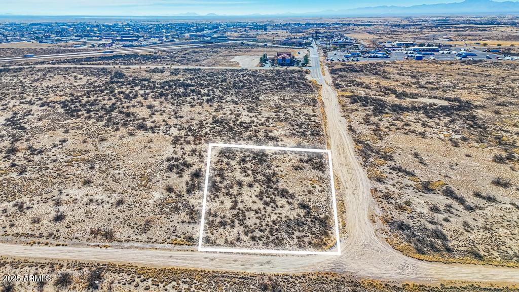 Motivated Seller-New Lower Price-Here is great corner lot at 1.75-acre parcel that is currently zoned H-1(Highway Service Zone) that offers many uses.  The code defines some of the uses as ''Automobile filling stations, cafes, motels, drive-ins (food service), garages, and any other uses permitted in the CC-1 central commercial zone'' Minutes from the Willcox ramp 340.
From Planner in Development Services-''Zoning H-1, Uses permitted - anything allowed in CC-1 (central commercial) see 17.66.020 plus uses stated in 17.56.020. The H-1 highway service zone covers the portion of the city which is primarily suited for commercial, and service uses to serve the traveling public, it is permissive in terms of use.''