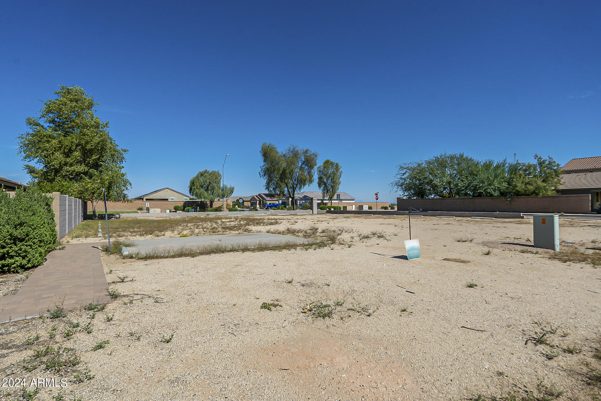 Excellent opportunity to build a brand new custom home in the coveted and desirable Tortosa community of Maricopa. A rapidly growing suburb of metro Phoenix. This parcel of land offers all utilities on site and next to a corner lot. Two sides have a block wall. Situated in a quiet area removed from major traffic streets. This opportunity will not last long.