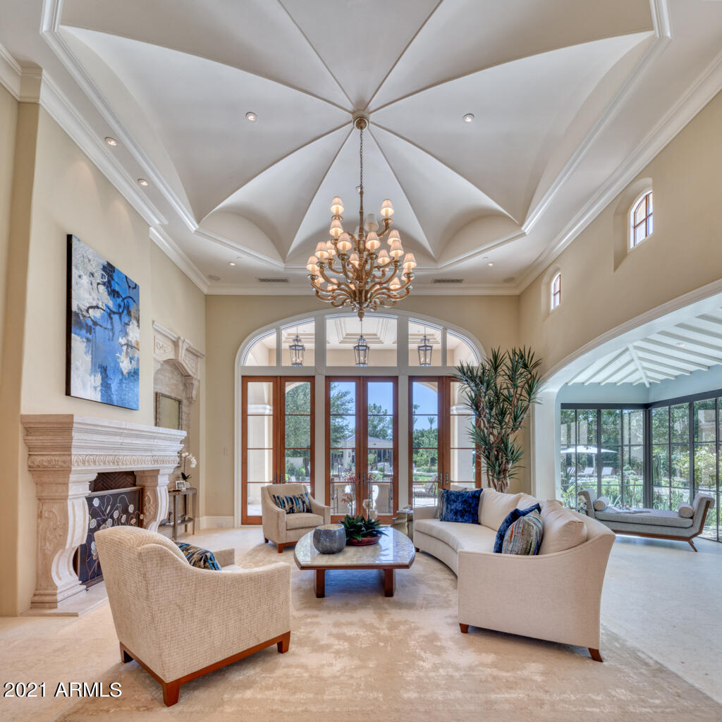 Unique soaring ceilings and graceful archways with details seldom seen in this newly updated 2019-2020 home. New exterior entertainment pavilion w/ fabulous zinc bar + glass walls retract on 3 sides. New exquisite Berghoff lush landscaping w/ extensive grass, flowering plants, a Well & many intimate patios provide lots of outdoor living space. Features include a chefs kitchen that opens to both an open catering area and a large family rm, 5 car garages, huge game rm with large bar & 4 TVs, beautiful paneled library, Savant system, wine rm, honed limestone + wood floors, 5 bedrms including master w/ sitting rm, his/hers bathrms+closets. Sanctuary-like grounds w/ 50' resort pool, fountains,firepits, 2 outdoor showers+ dogwash station. Candelaria architectural design + Janet Brooks interiors