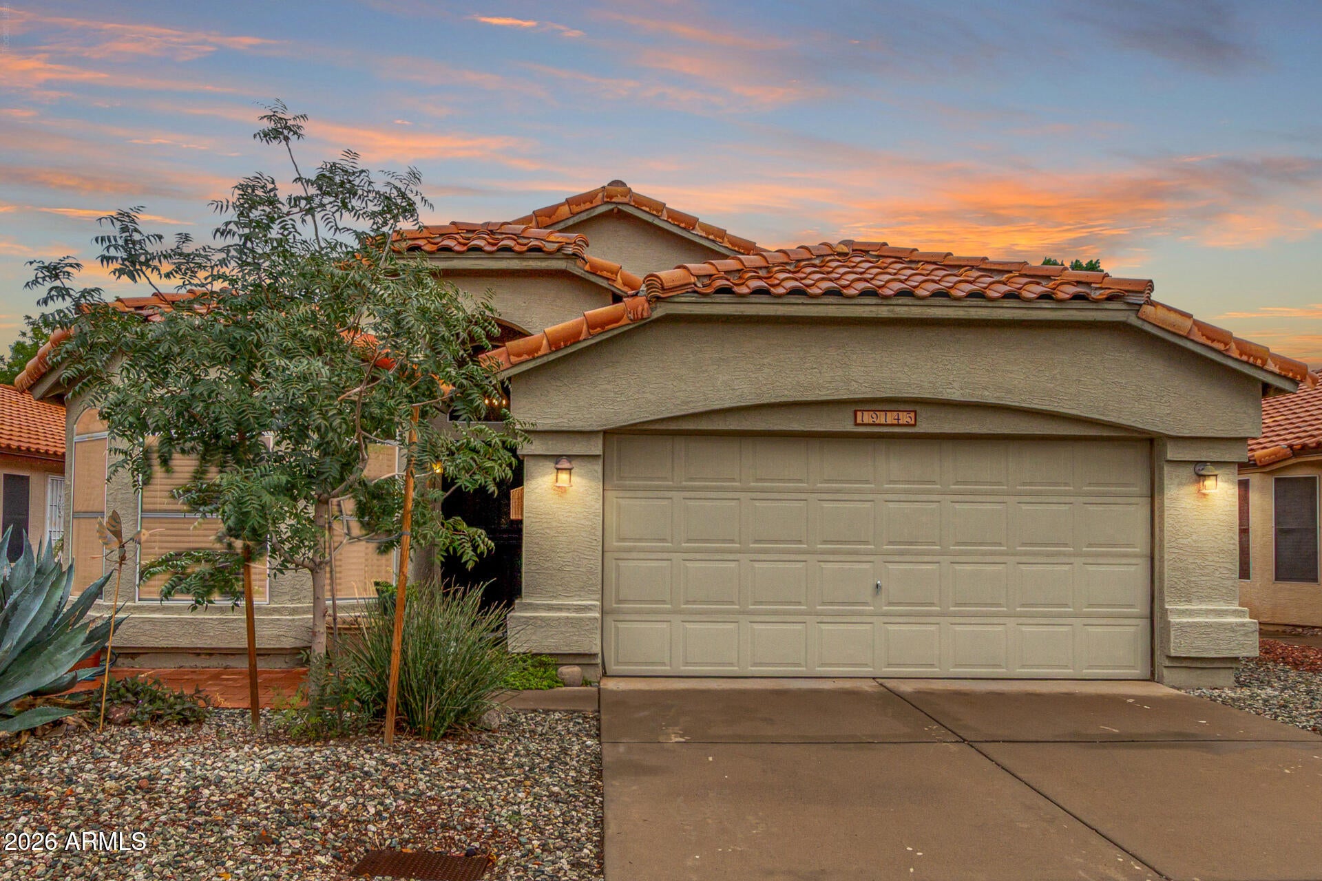 Nicely appointed 3 bedroom, 2 bath in Arrowhead Ranch with newer AC! Vaulted ceilings give the home ample natural light & highlight the upgrades throughout. Kitchen boasts stainless steel appliances, modern backsplash, upgraded counters & island. Cozy fireplace in the family room  The spacious primary retreat features walk-in closet & private bathroom with dual sinks and glass-enclosed updated shower. Hall bathroom has also been beautifully updated. Stylish window coverings throughout.Perfectly sized back yard provides nice sized covered patio and plenty of room for unwinding or entertaining. Solar keeps electric bills to a minimum year round. Low maintenance landscaping in front & back. Fiber optic just installed in neighborhood for super fast internet