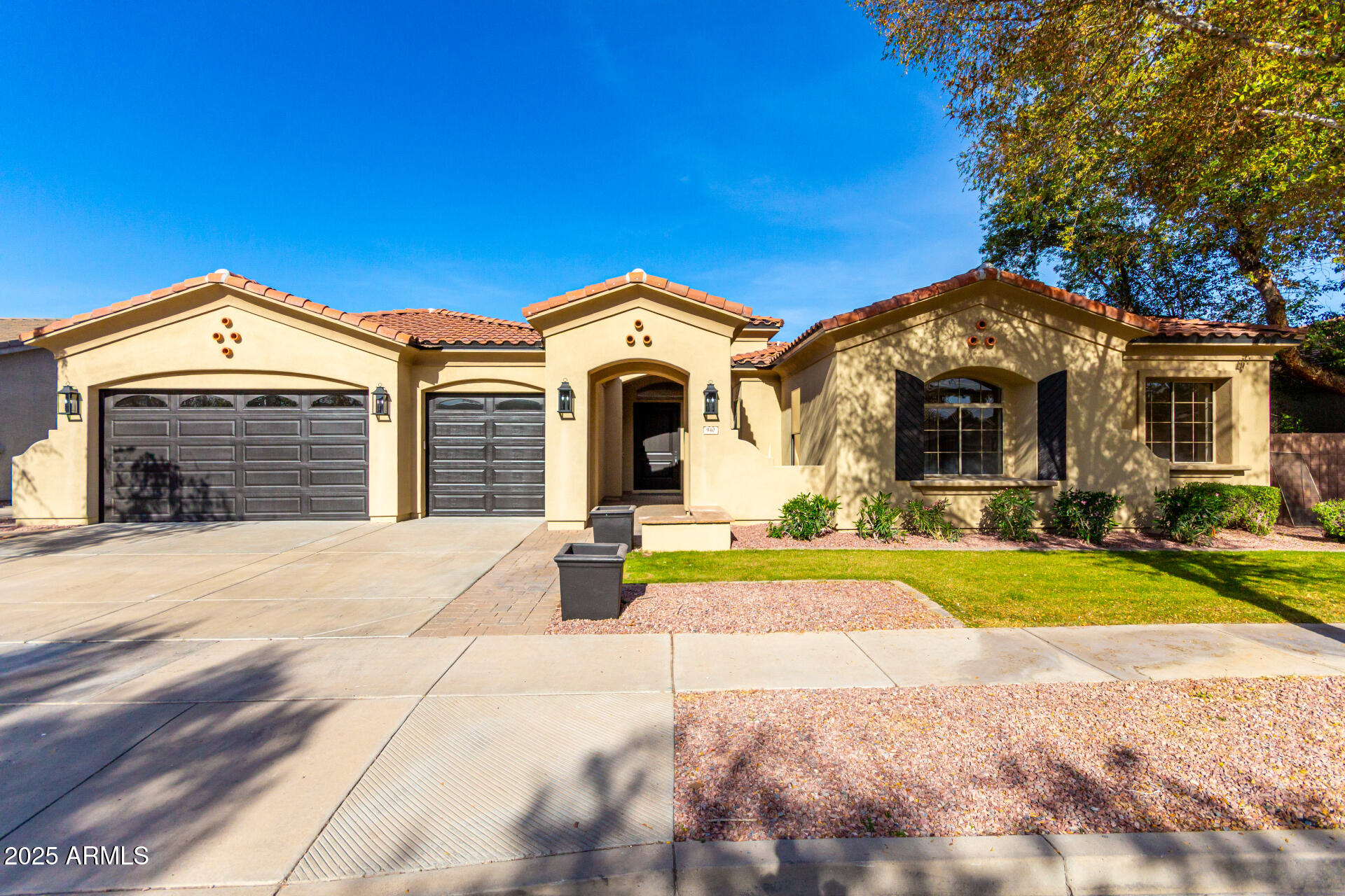 Completely reimagined and extensively remodeled, this stunning 5-bedroom home with a BASEMENT in Arden Park is practically a brand new home! Major upgrades include a brand new roof, three new AC units, fully remodeled bathrooms, all new luxury vinyl plank flooring, and new carpet. One of the standout upgrades is the newly added private laundry area inside the primary bathroom, creating a true luxury suite experience with its own dedicated washer and dryer setup in addition to the main laundry room, which also features brand new appliances. This is truly one of the finest homes in Arden Park, standing out with its exceptional upgrades, designer finishes, and impressive attention to detail. From the beautifully maintained curb appeal and inviting courtyard to the expansive 3-car garage, every inch of this home was designed to impress. Inside, soaring ceilings, elegant modern touches, recessed lighting, and a bright open layout create a luxurious atmosphere that feels both sophisticated and welcoming. The beautifully updated kitchen is the heart of the home, showcasing sleek quartz countertops, abundant white cabinetry with full wall backsplash, stainless steel appliances, and an oversized island perfect for gathering with family and friends. The adjacent family room features a beautiful stone-clad fireplace and plenty of space for entertaining.The thoughtfully designed floorplan also includes a versatile den ideal for a home office, gym, or playroom. And then there's the basement... a rare and incredible feature offering a massive bonus room, additional bedrooms, and a beautifully updated bathroom, making it ideal for guests, multi-generational living, game rooms, or media space. The luxurious primary suite offers backyard access, a cozy sitting area, and a spa-inspired bathroom with double vanities, soaking tub, walk-in closet, and the convenience of the newly added in-bathroom laundry area. Step outside to your own backyard retreat complete with a covered patio, built-in BBQ, lush turf, sparkling pool, and fire pit perfect for relaxing Arizona evenings under the stars. With the extensive renovations and major system upgrades already completed, this home delivers the feel of new construction in one of the area's most desirable neighborhoods.