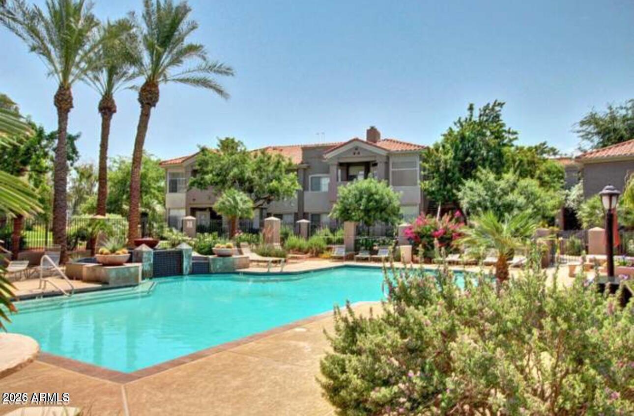 One-of-a-kind 1-bedroom condo with beautiful pool views and just a 3-minute walk to the community clubhouse and amenities. The upgraded kitchen features quartz countertops, rich wood cabinetry, newer stainless steel appliances, and a built-in microwave. The remodeled bathroom includes an updated vanity and modern fixtures, with stylish tile flooring throughout the home. A brand-new AC unit installed in 2025 adds year-round comfort. Enjoy resort-style living with access to community pools, spa, fitness center, and clubhouse, plus nearby walking and biking trails. Conveniently located in Ahwatukee just off I-10, close to dining, shopping, casinos, Downtown Phoenix, and Sky Harbor Airport. Water, sewer, and trash included. Available for move-in 4/2/2026.