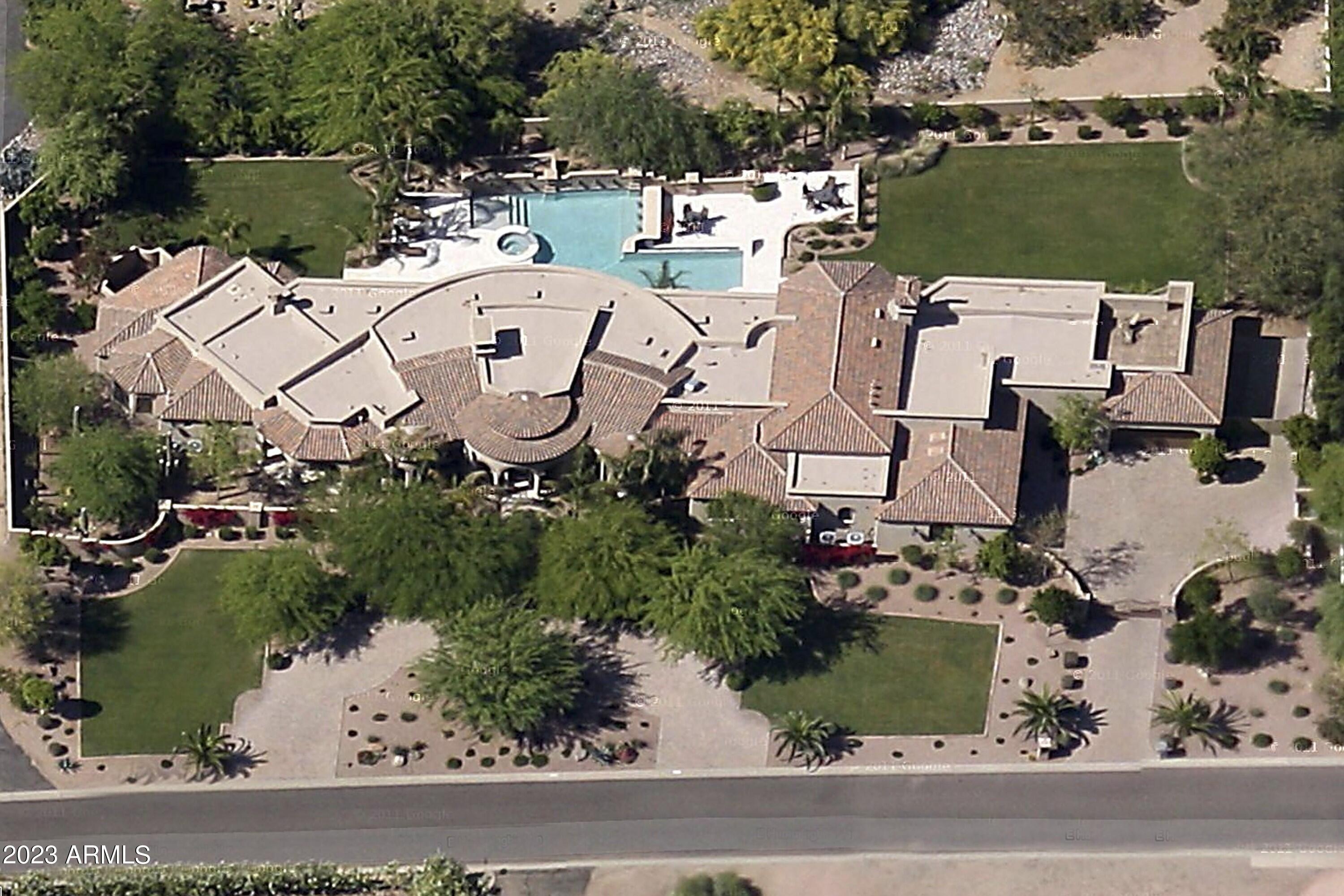 Well built elegant privately Gated Paradise Valley home at a premium location. Nearby shopping, dining, specialty fun seasonal events. We welcome you to comfort your soul in style, enjoy all the finer amenities like the fully automated Crestron system, Venetian plaster walls, a game of pool in the entertainment room, 30 plus TV's to include 700+ pre-recorded movies, steam shower, indoor and outdoor Bar, wine room, three (3) of everything Appliance package, Four zone climate control for heating and cooling, enormous swimming pool plus spa, cozy fire places all on a functional (Single level, No steps)