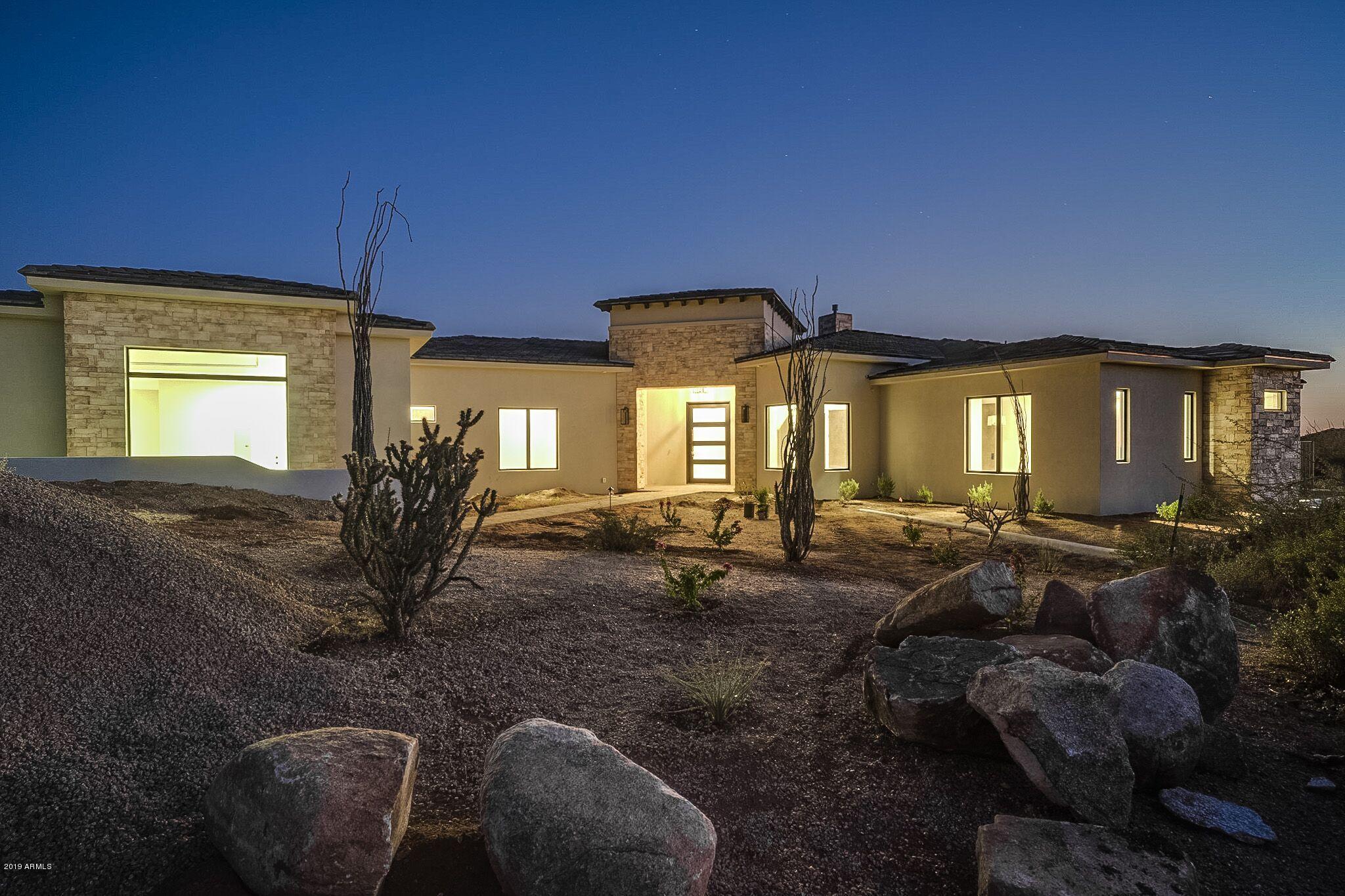 BRAND NEW CUSTOM w/ MTN. & CITY LIGHTS VIEWS **MOVE IN AVAILABLE** NOV 7TH 2019**  Desert Modern - Highly Appointed, Pella Windows & French doors, Countless Upgrades, Floor to Ceiling Linear & Stone Fireplace, Custom Lower Cabinets in Grey Matte & High Gloss White uppers. BOLD Water Fall w/QUARTSITE & MARBLE Kitchen Tops.  Baths w/ Marble Tops,  DECOR Master Free-standing Tub, Great room w/ Two Pocket Glass doors, Engineered Wood Floors, Expansive Patio allowing seamless Indoor/Outdoor Living. Sub Zero, Wolf Appliances, Sparkling Pool & Spa Almost done, Backyard Artistic & Travertine Pavers , LUXE Architecture. Quality Built! 2 YR WARR. Please Excuse our Touch-ups & Finishing almost done! STAGING COMPLETED. MOUNTAINS, CITY LIGHTS and DESERT VIEWS!!