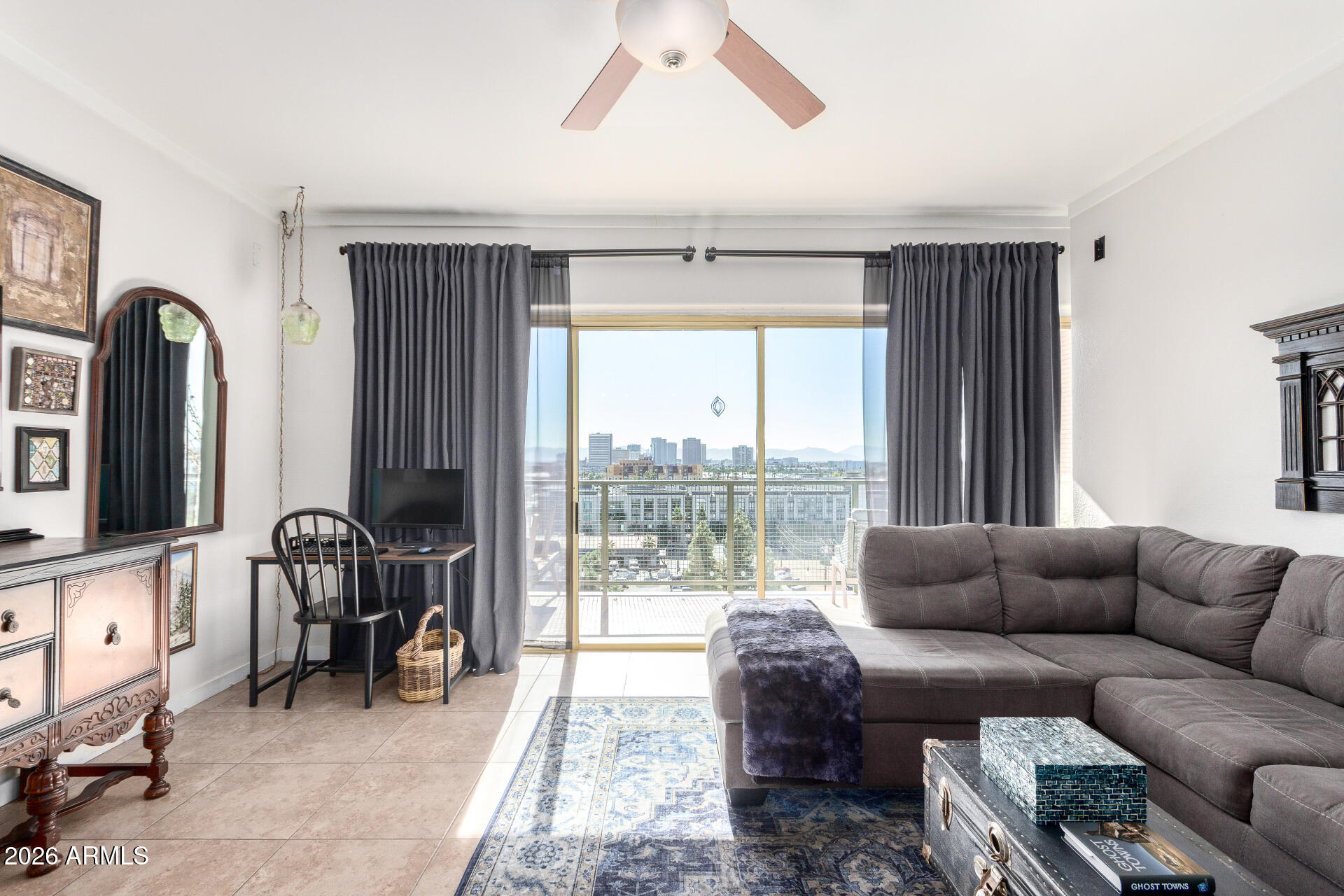 Own a piece of Arizona history at Landmark Towers, a mid-century modern icon in the Central Corridor. This rare 8th-floor unit sits in a tucked-away stack with no neighbors on either side and minimal sun exposure. Floor-to-ceiling windows and a panoramic balcony showcase city and mountain views. Amenities include 24-hour security, doorman, heated pool and spa, fitness center, clubhouse, theater room, rooftop lounge, BBQs, and secured underground parking. HOA covers A/C, heat, water, WiFi, and laundry. On-site bistro, wine bar, shopping, light rail nearby. Renovations underway. Most furnishings available. Telescope conveys. MUST SEE.