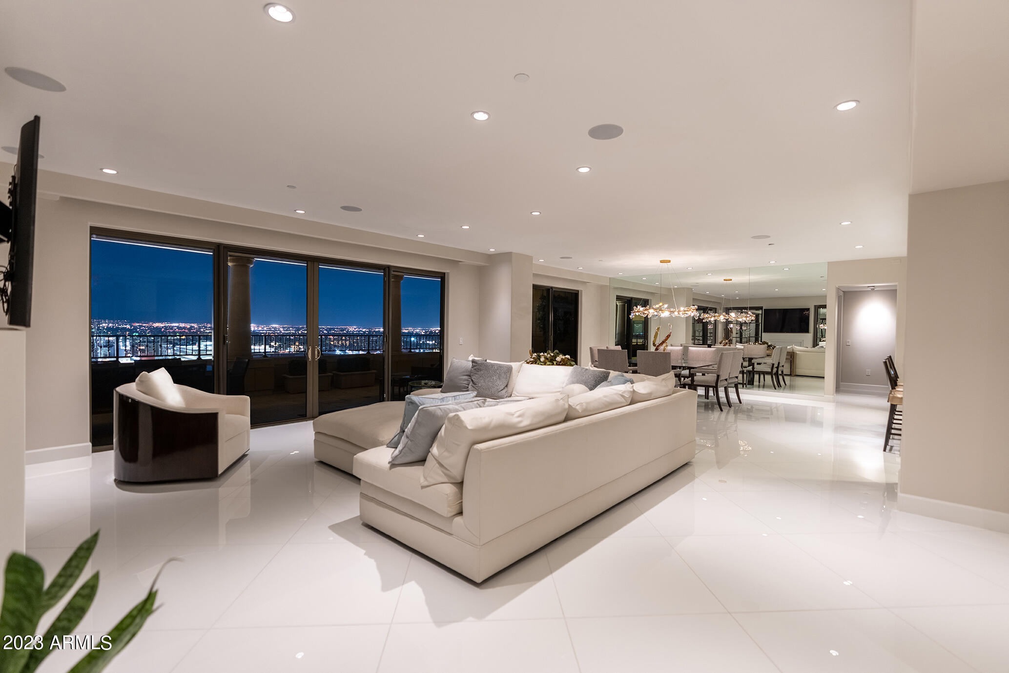 Absolutely gorgeous and elegant, completely updated penthouse, appointed to perfection with  glorious views. This stunning unit has private master with sitting area, exercise area, handsome closet, extra storage, and beautiful master bathroom. Striking great room and formal living room open to kitchen with beautiful balcony with spectacular views. Gorgeous den and wine cellar, two large bedrooms en suite bathrooms and walk in closets. the bedroom wing includes a huge family/theater room separate from formal living & dining room. Enjoy the luxurious  lifestyle Scottsdale Waterfront has to offer including 24/7 front desk, valet & private underground parking,fitness center. elegant club room with bar and dining rooms, roof top pool and spa, wine cellar and BBQs. 
This penthouse is exquisite