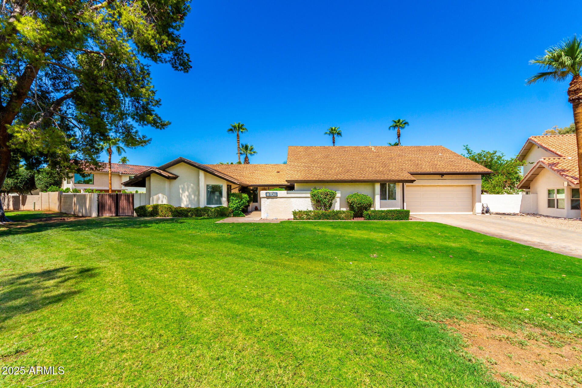 Priced at APPRAISED VALUE -- Best deal in much-sought-after McCormick Ranch! Expansive 2-level home with adorable casita! Prestigious cul-de-sac location adjacent to the community greenbelt. Fall in love with the lush grassy front yard, 2-car garage w/paver driveway, RV gate, & adorable courtyard entry. Vaulted beamed ceilings, soothing palette, tile/carpet floors, fire sprinklers, & skylights, fireplaces and inviting views from every room can't be left unsaid. The huge family room is perfect for intimate, snuggly nights! Cook gourmet recipes in the fully equipped kitchen boasting black matching appliances, a center island, ample counters, a plethora of wood cabinets, & a pantry. There are two main bedrooms with their own bathrooms, including grab bars for extra safety. Cozy bedrooms on 2nd floor and generous sized ones on the 1st with spacious closets, beautiful bathrooms, charming bonus room, & two den/office rooms for added convenience. Do not miss the cabinets & sink in the laundry room!  Adorable casita offers a beehive fireplace, French doors, & private bathroom. Spend house of outdoor fun in this entertainer's backyard with its full-length covered patio w/ceiling fans, a blue pool w/spa, green grass, shade trees, a large dog run, & a paved seating area. Convenient location to highways and shopping, and nearby walking and biking paths offer additional outdoor fun.