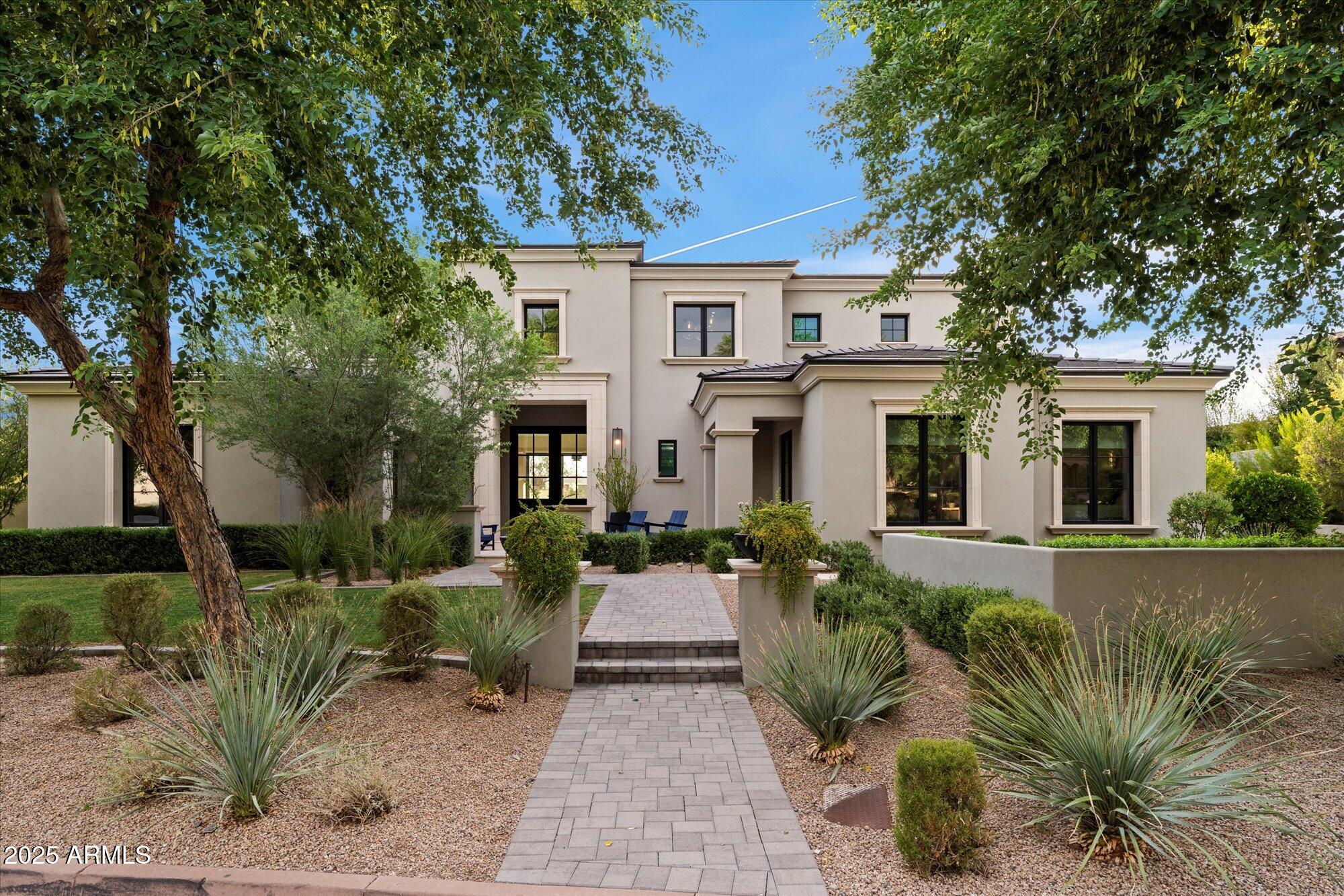 Looks can be deceiving.  Behind Silverleaf's 24/7/365 Guard Gate, this stately residence looks like a normal timeless 8 Bedroom 10 Bathroom home...6-Bedroom, 8-Bathroom main home - 1 attached Guest Casita plus 1 Detached Guest Casita, but the home offers a HIDDEN GEM that stands out from every other home in Scottsdale.  Featuring a private lower level with a media room/lounge, kitchen, bunk room that sleeps 8 & a **3,000+ sqft indoor sports & recreation facility**.  Whether you have a big family, want to be the cool house for your kids to hang out at, or you are training your child to be the next big name in sports; this Facility has it all:  soccer, ice hockey, baseball, pickleball, roller skating, dance, etc - where you can enjoy it year round, or step up training to the next level.