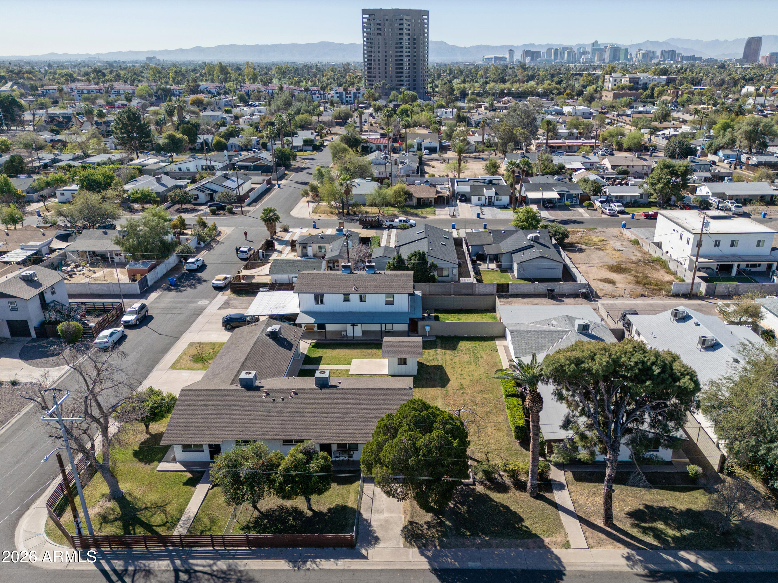 1017 -1031 E Fairmount is an 8-unit apartment community located in the highly desirable Midtown Phoenix submarket. Built in 1966,  The unit mix consists of (3) 1x1 units, (3) 2x1 units, and (2) 2x1.5 units, with an average rent of $1,528. 6 of the 8 units have been fully renovated with thoughtful, durable improvements including luxury vinyl plank flooring, quartz countertops, workstation-style extra-wide sinks, mini range hoods, updated light fixtures, and refreshed bathrooms featuring new tubs, tile backsplash, and modern vanities. All units offering in-suite washer/dryer or dedicated W/D access. The property also features large private front and backyards, 3 private garages, 2 covered carport spaces, and lush landscaping. 6.03% cap rate on current financials.