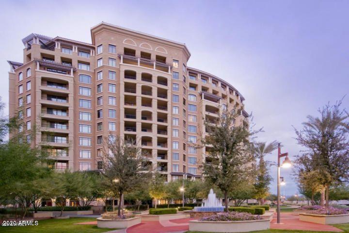 Gorgeous unit! Spacious floorplan including formal entrance leading to a large great room, 3 split bedrooms and 3.5 bathrooms, master bathroom with spa. Unit offers spectacular views of Camelback Mountain, high end wood flooring, travertine, and granite throughout. Viking appliances, custom designer paint, electrical and sound upgrade packages are all included. 24 hour security, gym, pool, clubhouse, and several other luxurious amenities provided to all residents.Excellent investment opportunity! Seller is willing to sign a 1-2 year lease back. Don't miss this opportunity before it's gone!