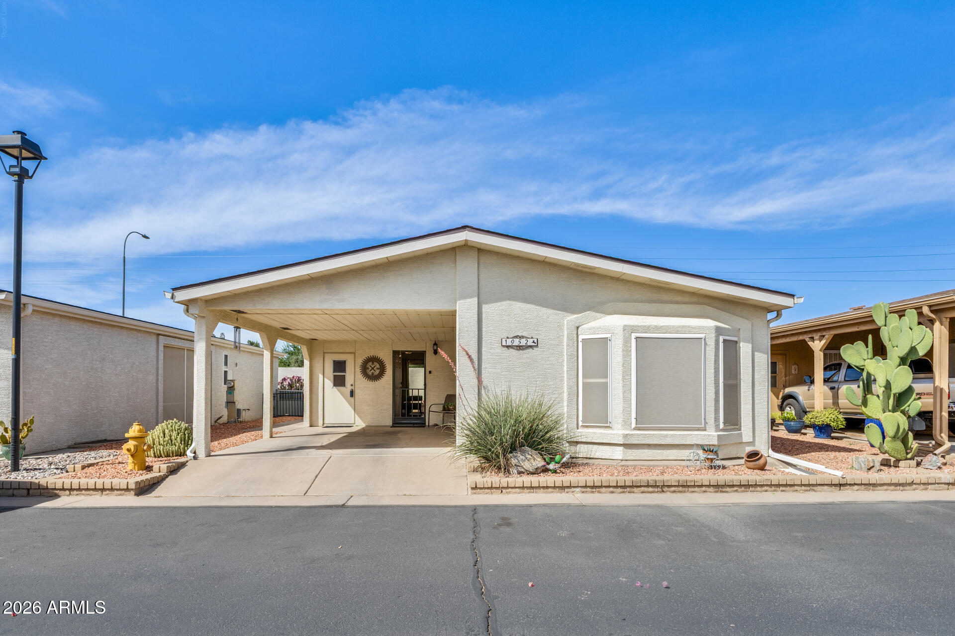 Beautiful, well-maintained home in Sunbird Golf Resort. Two spacious bedrooms and two full baths in the popular Sunbird Golf Community 55+ (ages 50-54 check with HOA).  Tile and LVP throughout. Accent walls, painted kitchen cabinets and built-ins complete this cute, move-in ready villa. Private back patio area with accent wall makes for a lovely seating area. Low maintenance desert landscaping. New hot water heater (2025), updated primary shower (2024). Sunbird amenities include Horizon Room restaurant & spirits, clubhouse, fitness center, two pools, hot tub, pickleball, tennis, ceramics, lapidary, library, bocce ball, shuffleboard, and too many activities to list!
